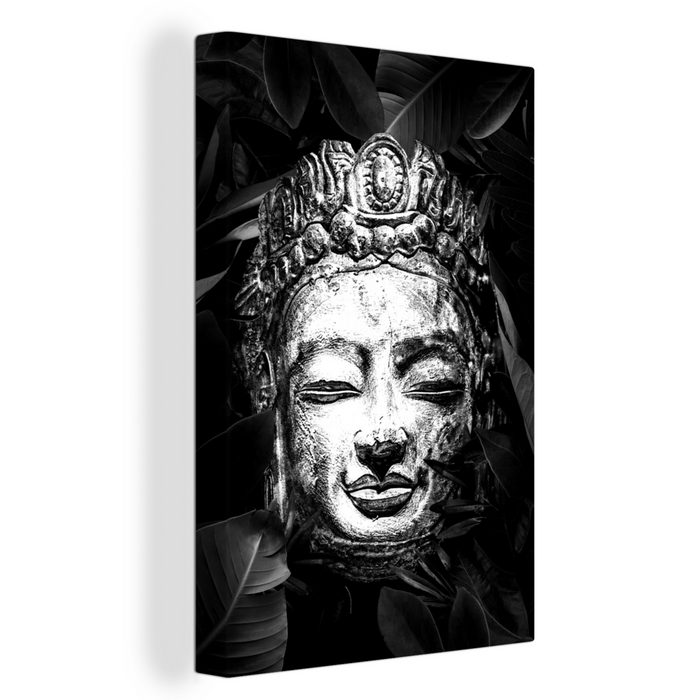OneMillionCanvasses® Leinwandbild Rauher Kopf eines Buddhas mit Blättern - schwarz und weiß (1 St) Leinwandbild fertig bespannt inkl. Zackenaufhänger Gemälde