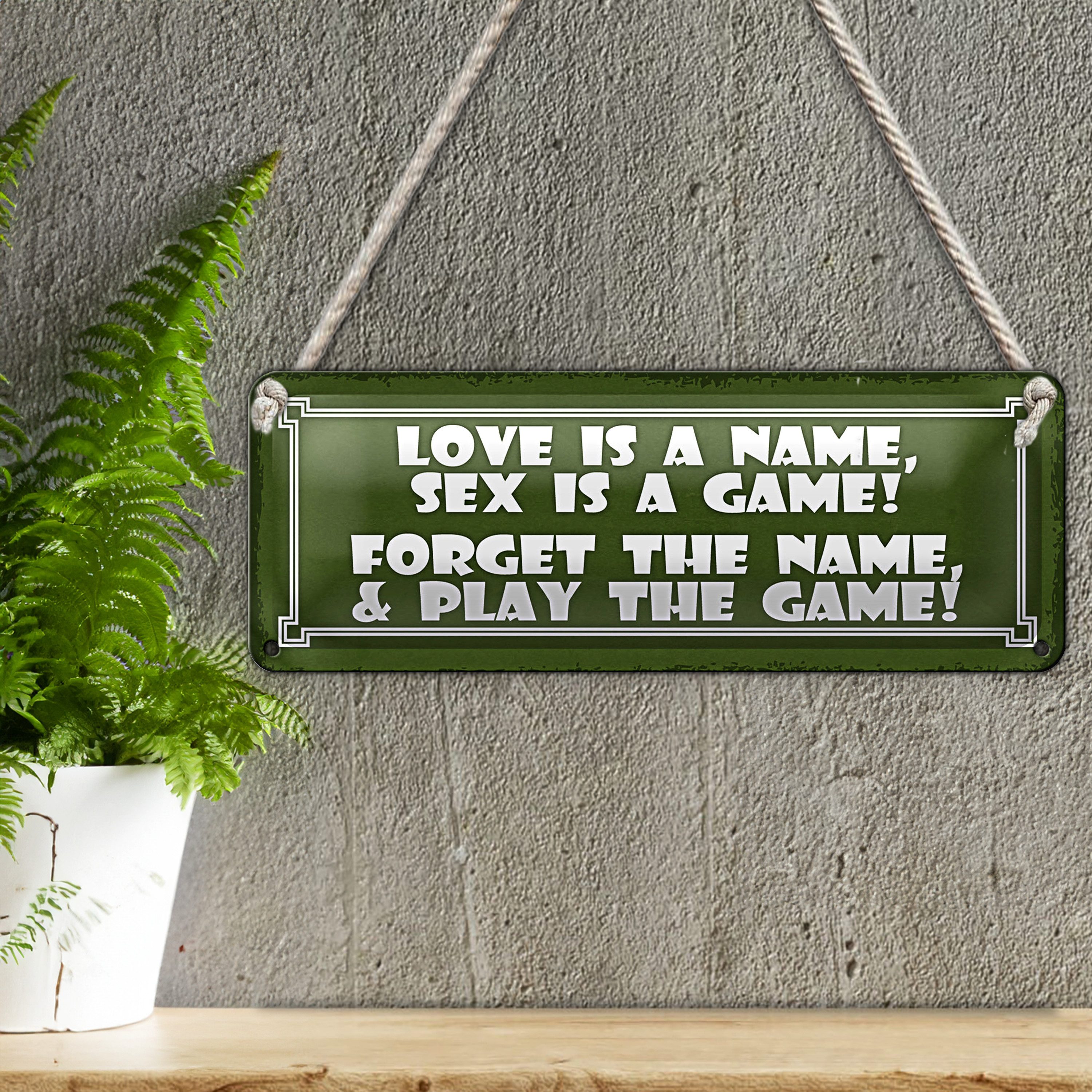 Roomando Metallschild Blechschild Spruch 27x10cm Love is a name sex is a game Dekoration
