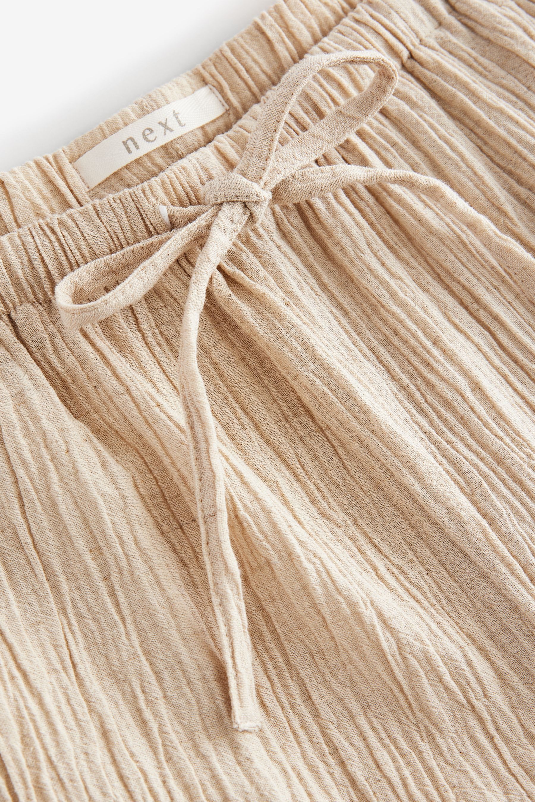 Next Palazzohose Strukturierte Hose mit weitem Bein, Kurzgröße (1-tlg) günstig online kaufen