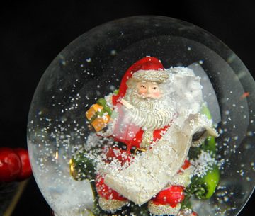 MINIUM-Collection Schneekugel Weihnachtsmann Geschenkeliste 100 mm breit Sockel silber glänzend