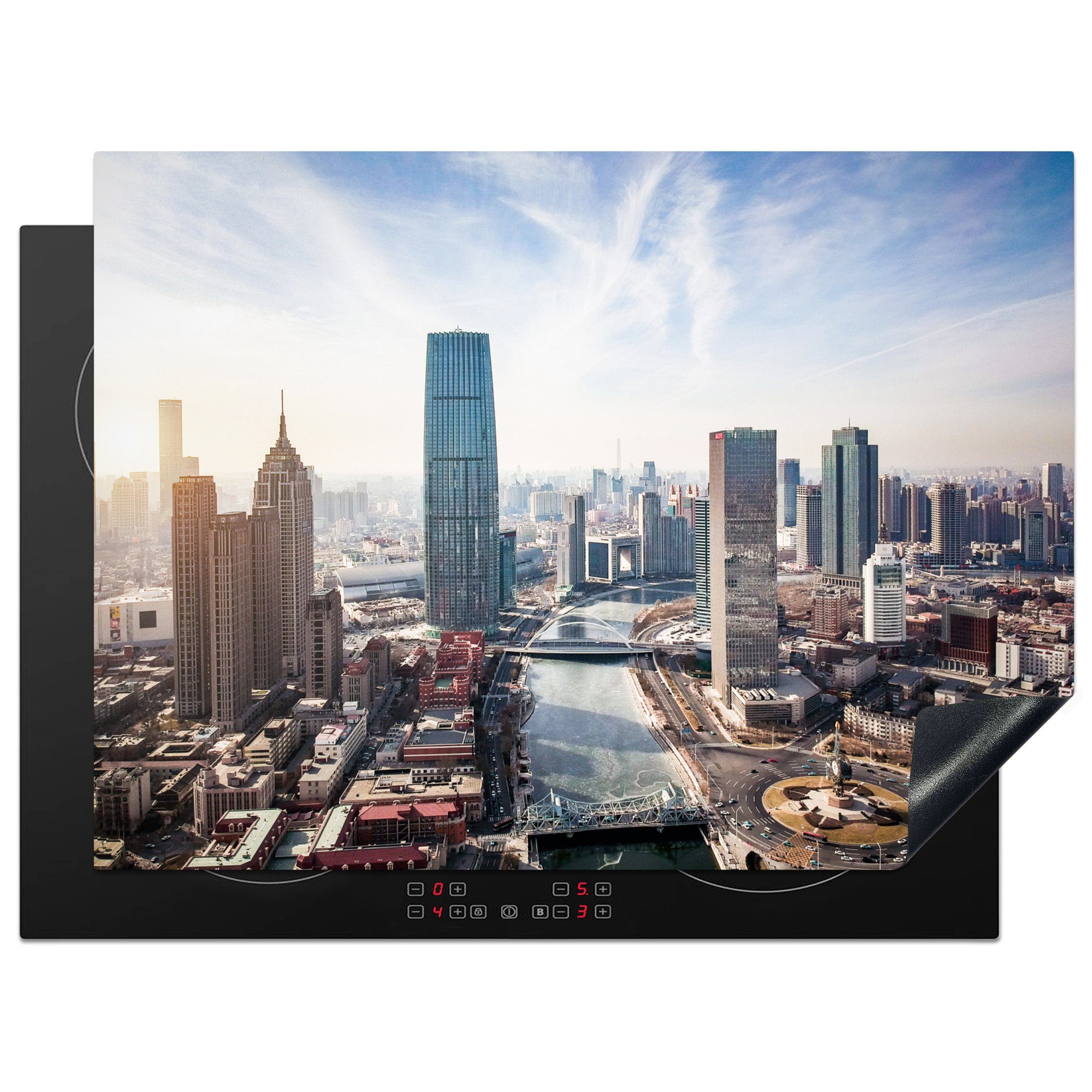 MuchoWow Herdblende-/Abdeckplatte Wolken über der Stadt Tianjin in China, Vinyl, (1 tlg), 70x52 cm, Mobile Arbeitsfläche nutzbar, Ceranfeldabdeckung