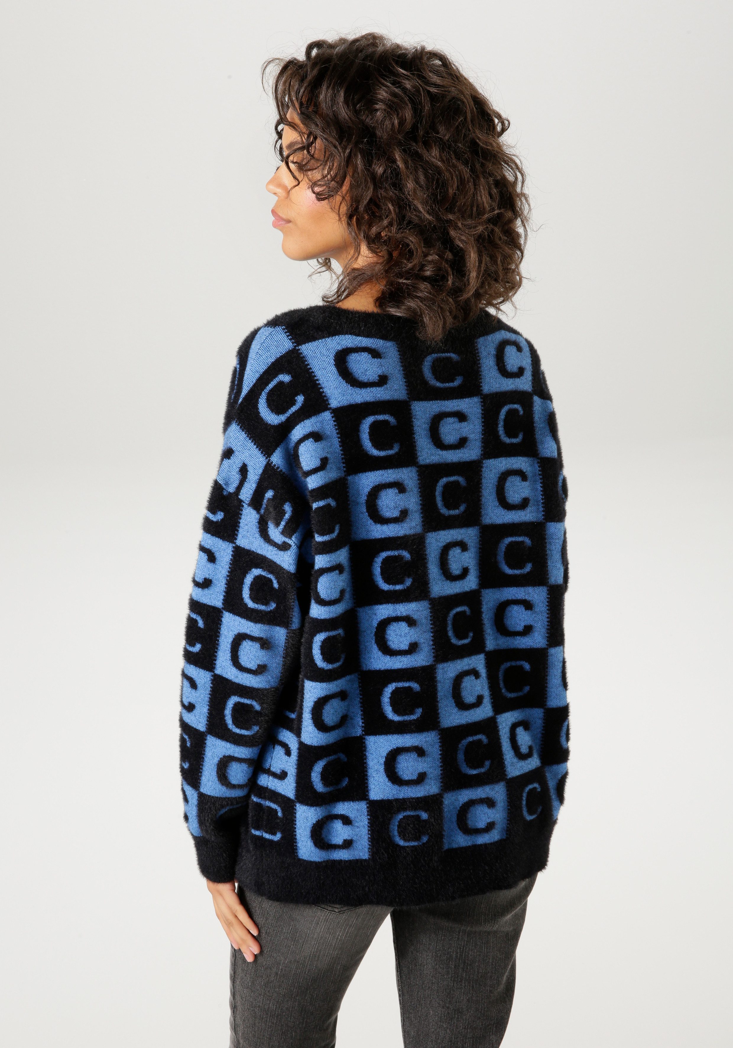 Aniston CASUAL Strickpullover mit extravaganten 2-farbigen Quadraten günstig online kaufen