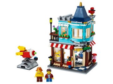 LEGO® Konstruktionsspielsteine LEGO® Creator 3in1 - Spielzeugladen im Stadthaus, (Set, 554 St)