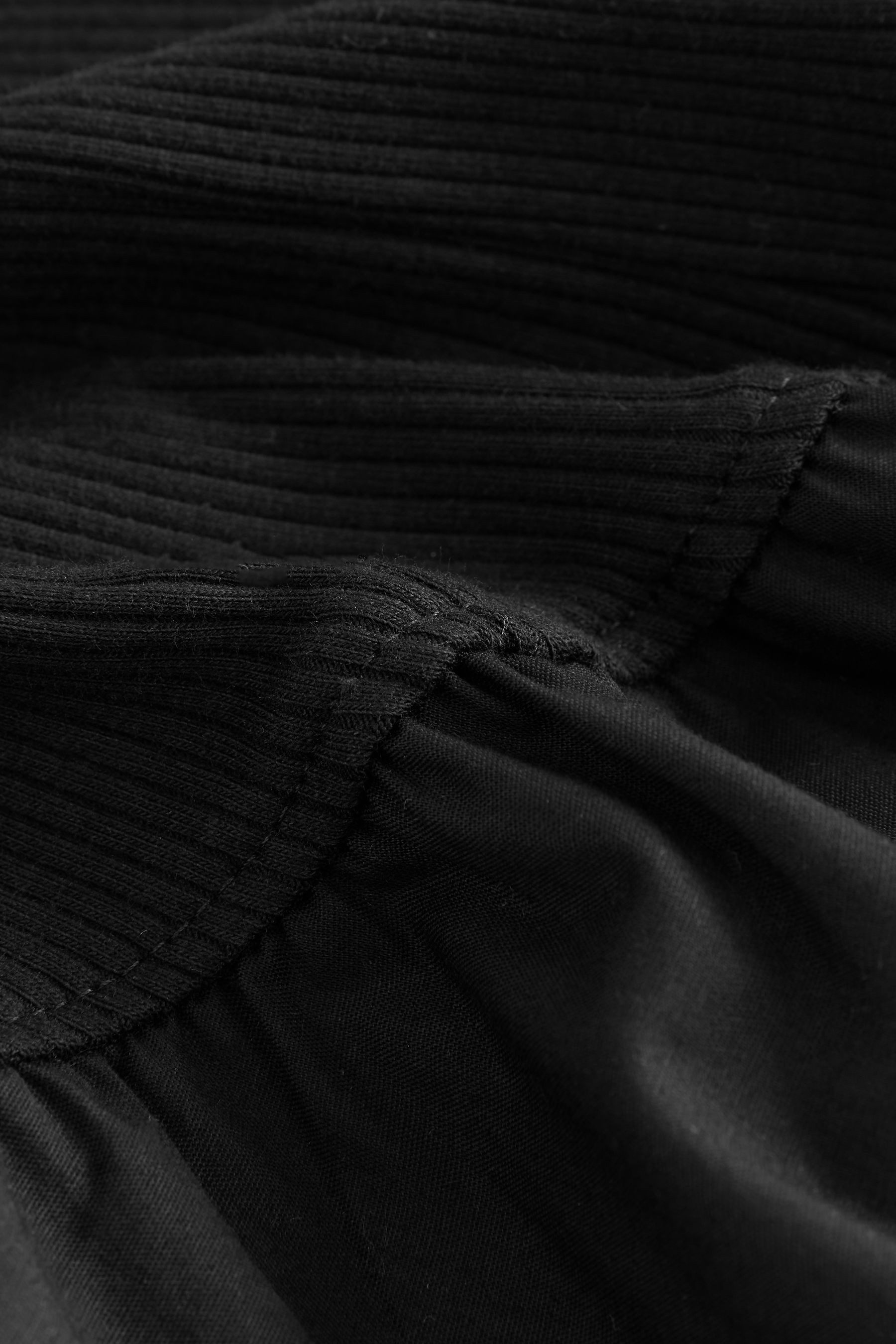 Next Midikleid Ärmelloses Midi-Rippenstrickkleid mit Racerback (1-tlg)