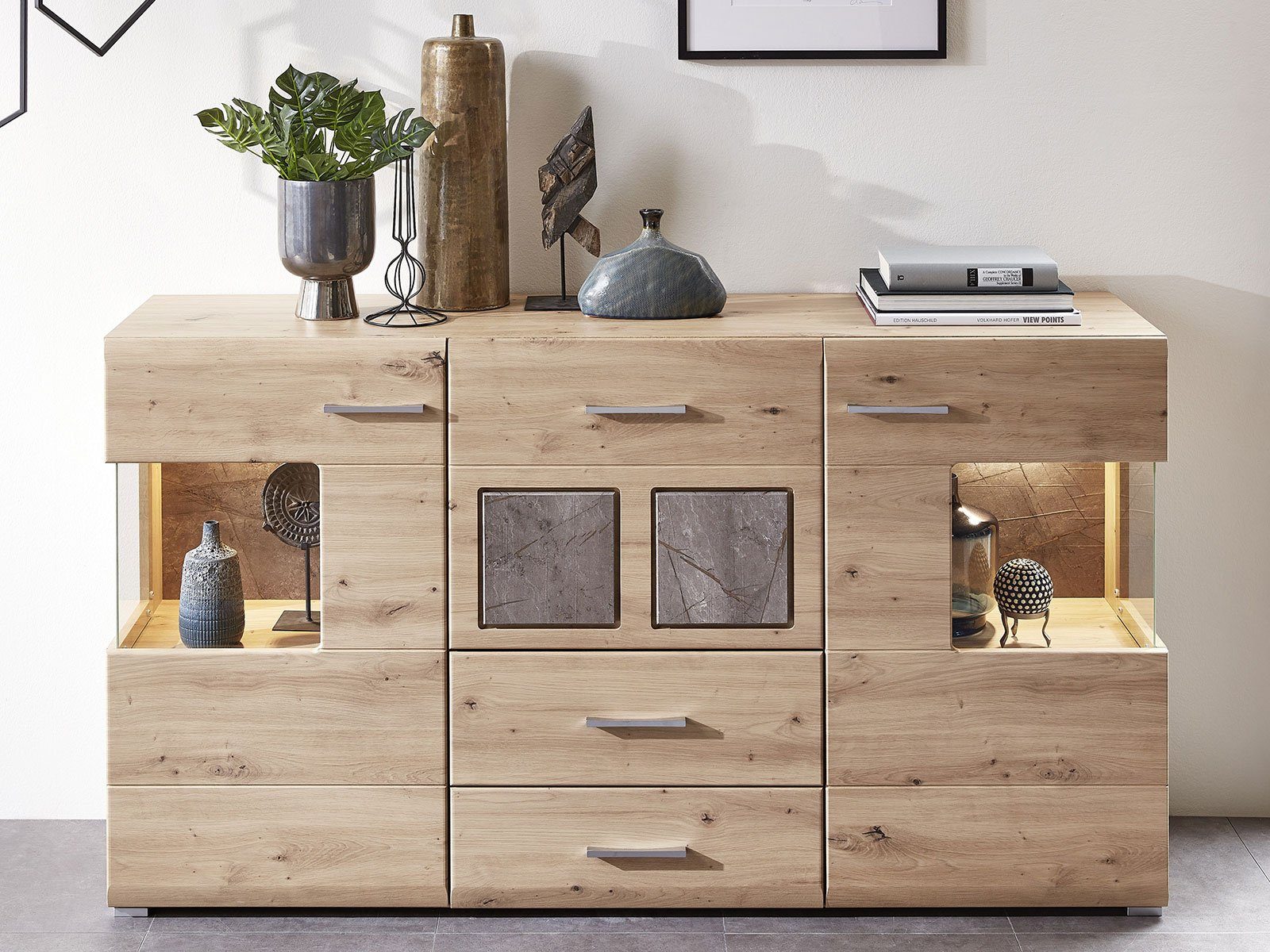 möbelando Sideboard Springhill, Modernes Sideboard in Artisan Eiche Nachbildung, Korpus aus Spanpatte, Front aus MDF, Absetzungen aus Spanplatte in Caspio Nachbildung mit 2 Glas-/Holztüren, 3 Schubkästen und 4 Konstruktionsböden, inkl. LED-Beleuchtung. Breite 170 cm, Höhe 94 cm, Tiefe 42 cm