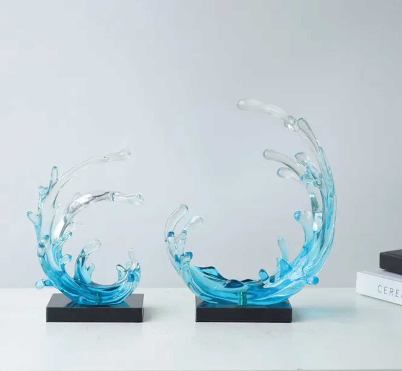 Dekoobjekt 2er-Set Wellen-Skulpturen aus klarem Resin