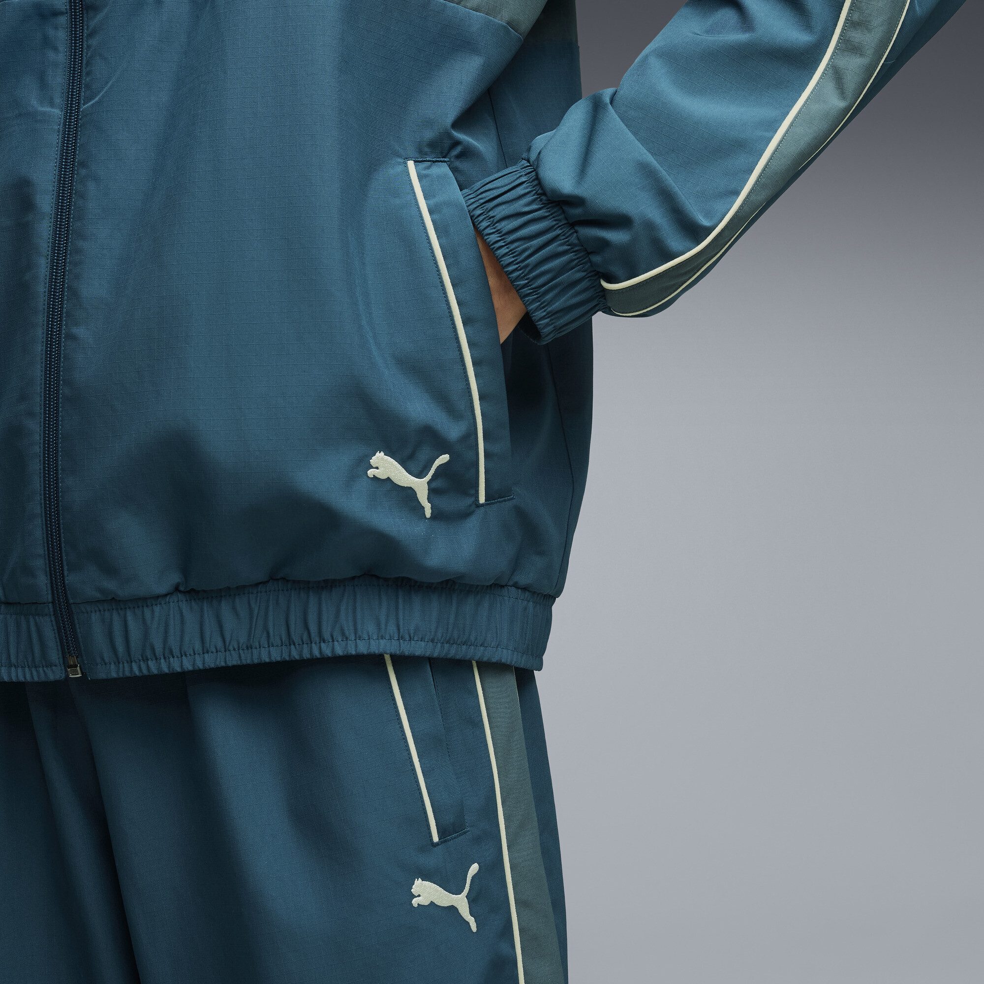 PUMA Trainingsjacke T7 Relaxed Gewebte Trainingsjacke Herren