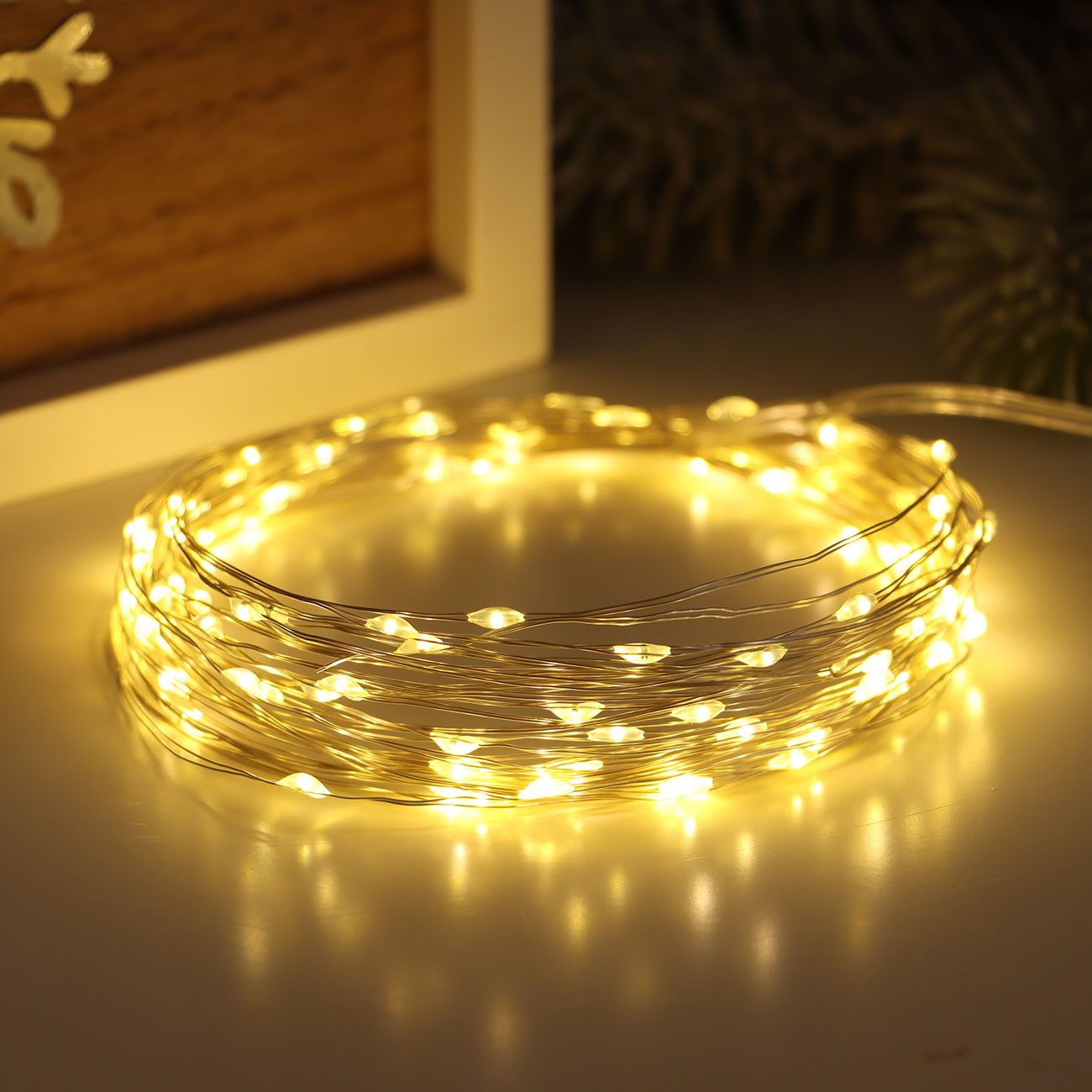 shop'n smile ideoon LED-Lichterkette LED Micro Draht Lichterkette 10m 100 LEDs Warmweiß Timer Fernbedienung, 10m Micro-Drahtlichterkette, 8 Leuchtmodi, Infrarot – Bild 4 von 5