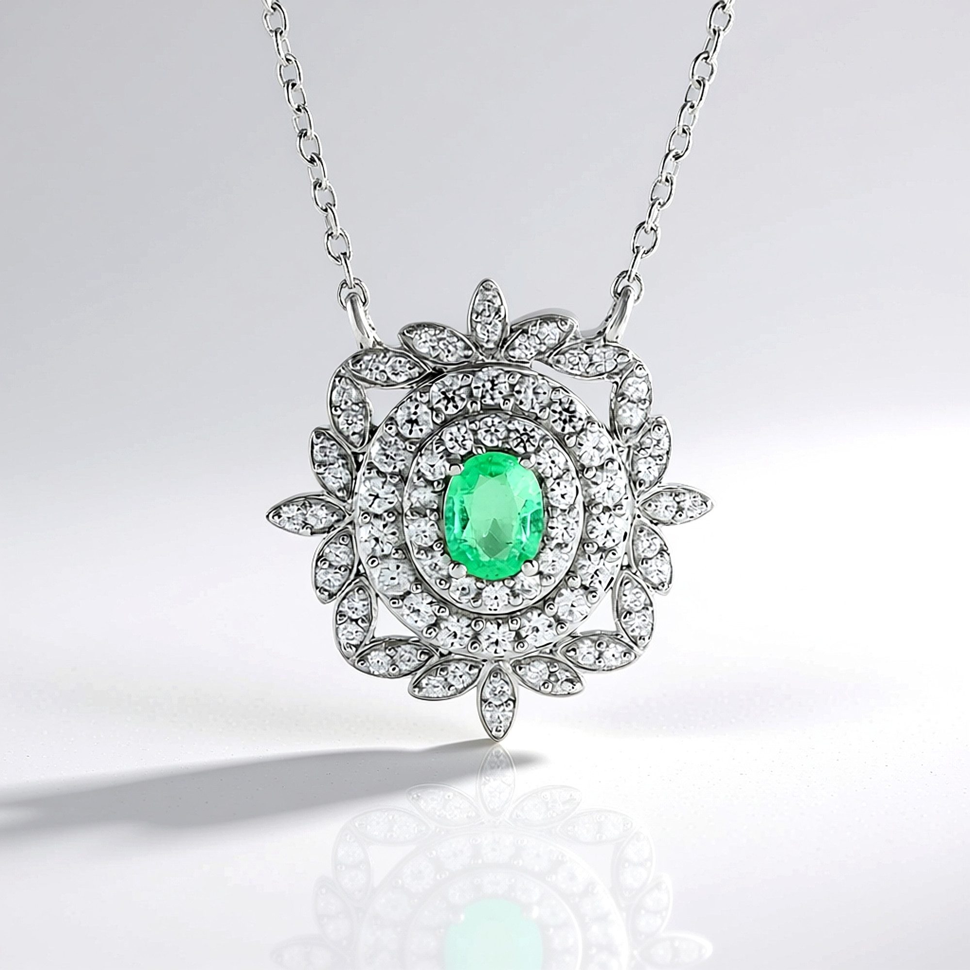Cavill Silberkette Cavill Smaragd 0,28 ct Oval Silbercollier mit Zirkon-Blüte platin. (1-tlg)