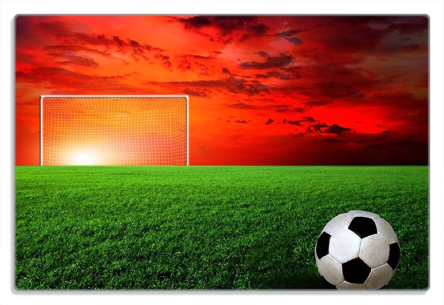 Wallario Frühstücksbrett Fußball - Fußballfeld bei Sonnenuntergang, (inkl. rutschfester Gummifüße 4mm, 1-St), 20x30cm