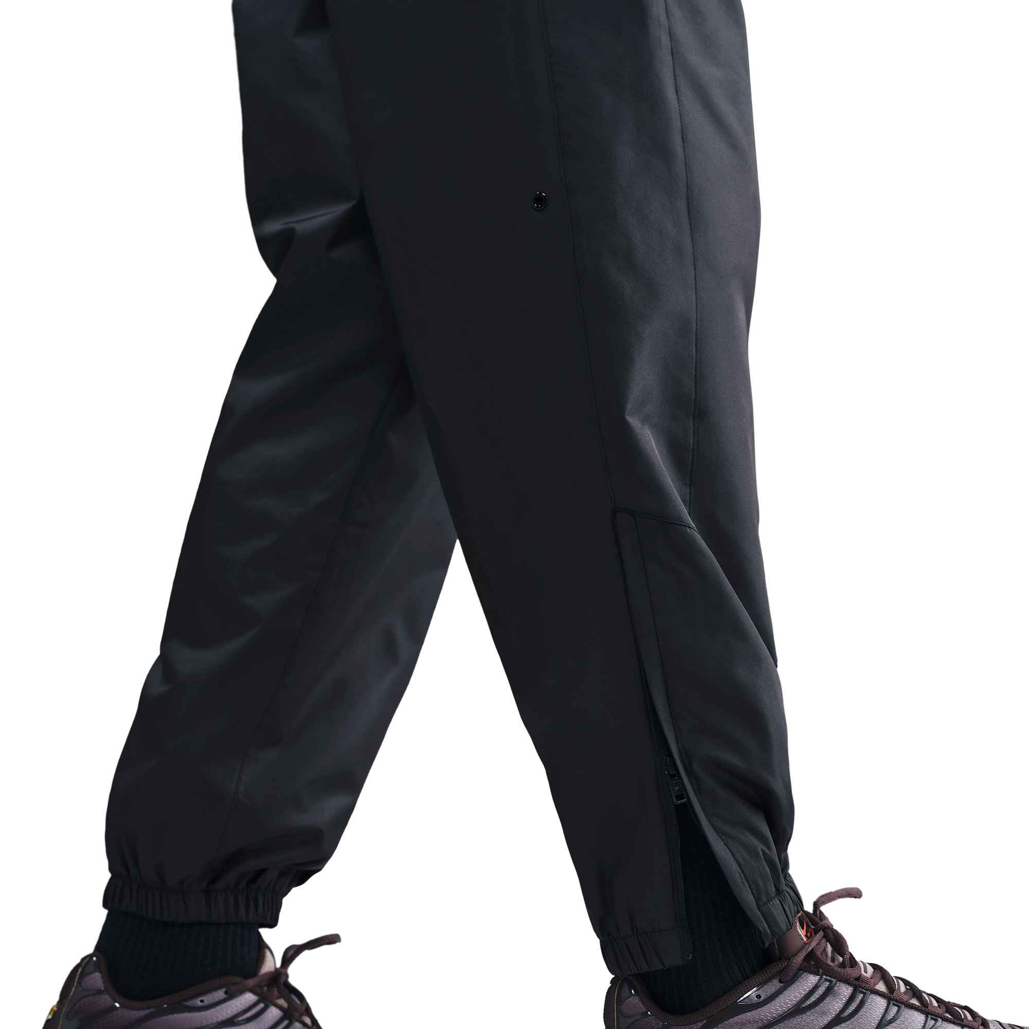 Nike Sportswear Sporthose Nike Windrunner Men's Lined Pants mit wetterfester Technologie