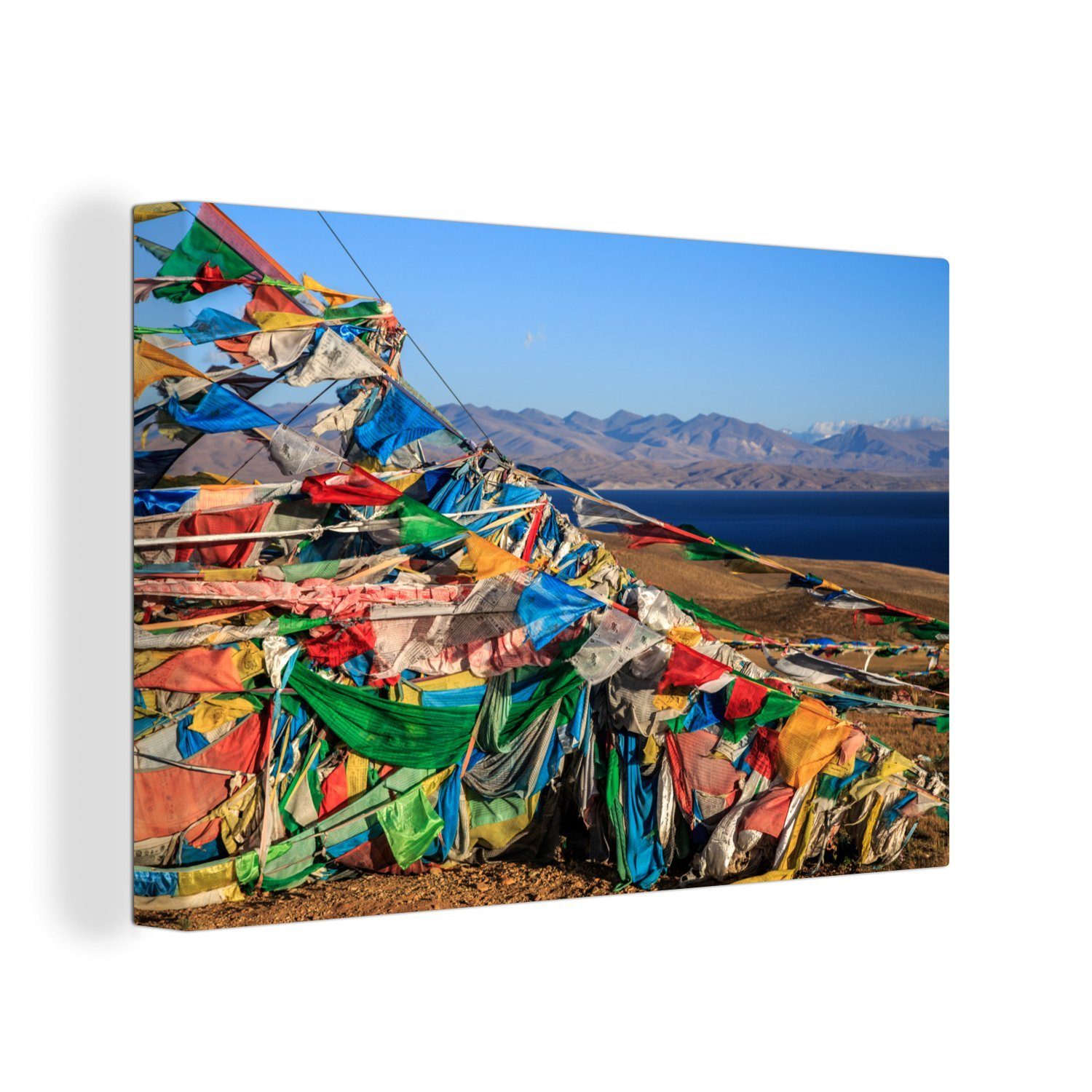 OneMillionCanvasses® Leinwandbild Tibetische Gebetsfahnen an der Küste des Manasarovar in Asien, (1 St), Wandbild Leinwandbilder, Aufhängefertig, Wanddeko, 30x20 cm