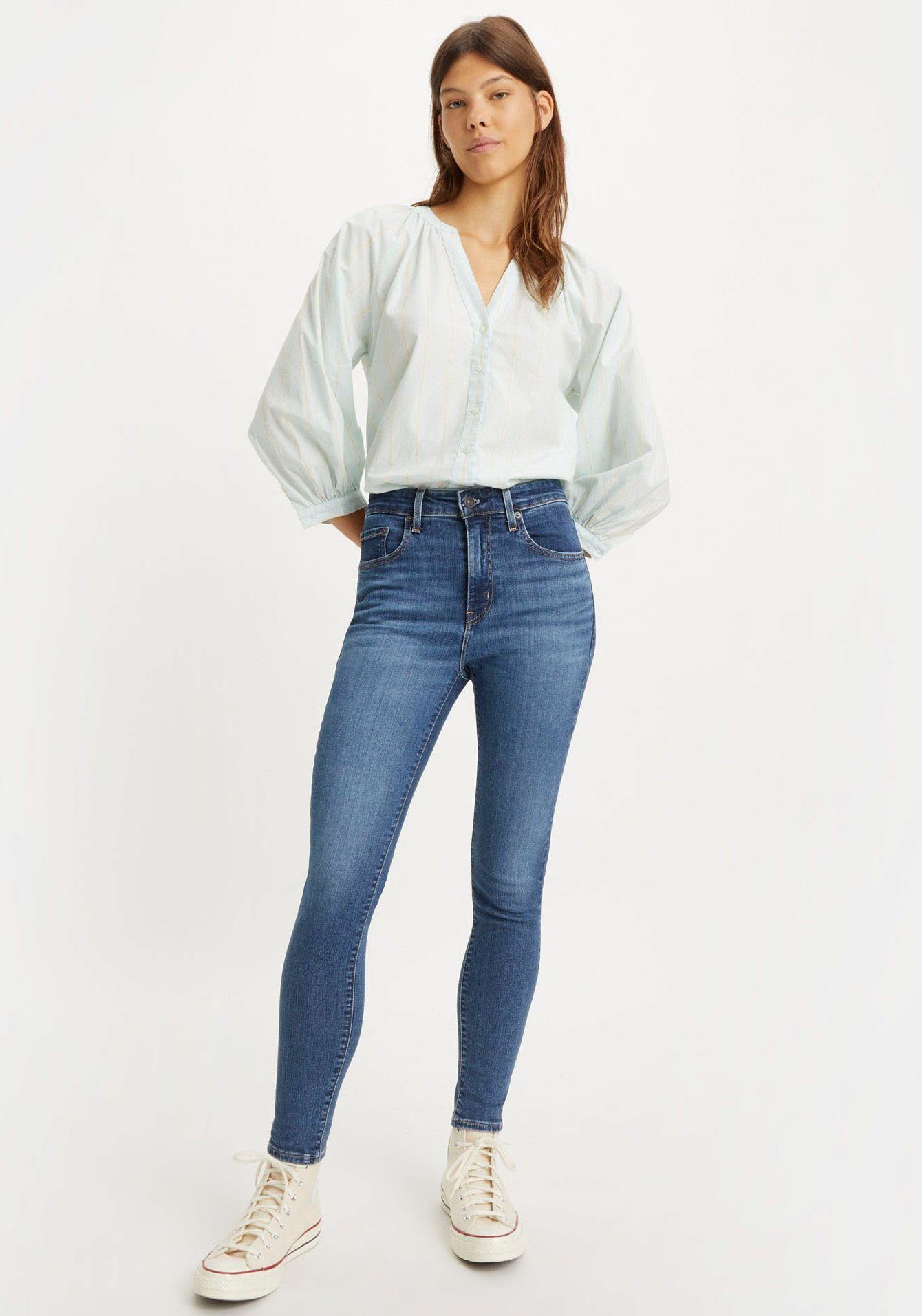 Levi's® in indigo rise High mit Bund 721 skinny blue mid hohem worn Skinny-fit-Jeans
