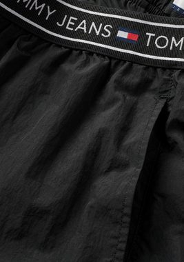 Tommy Jeans Webhose TJW BAGGY TAPING TRACKPANT EXT mit Logoprägung