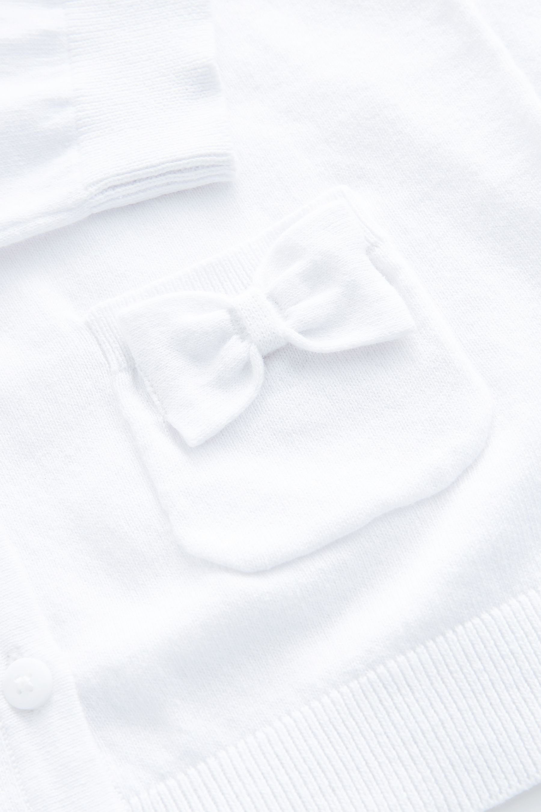 Strickjacke (1-tlg) Next White mit schleifenverzierten Strickjacke Taschen