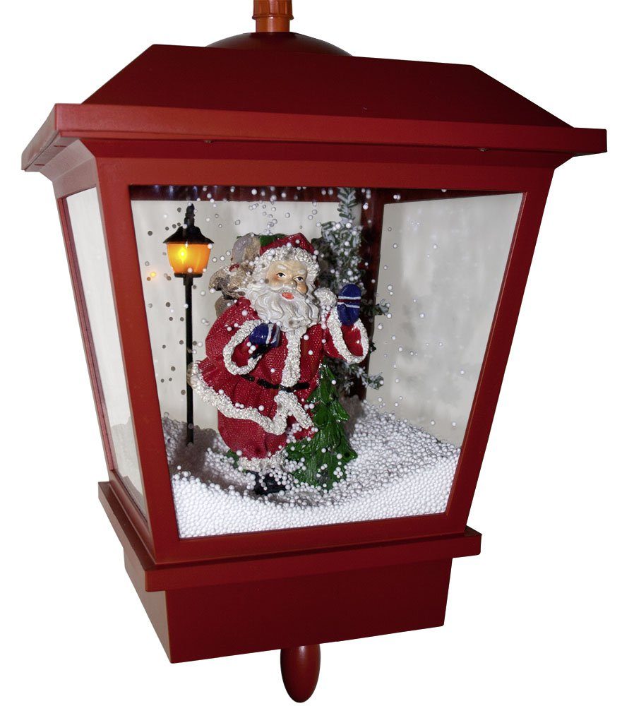 MONOPOL® LED Laterne Schneiende LED Doppel-Laterne 195 cm rot mit Weihnachtsmann u. -baum