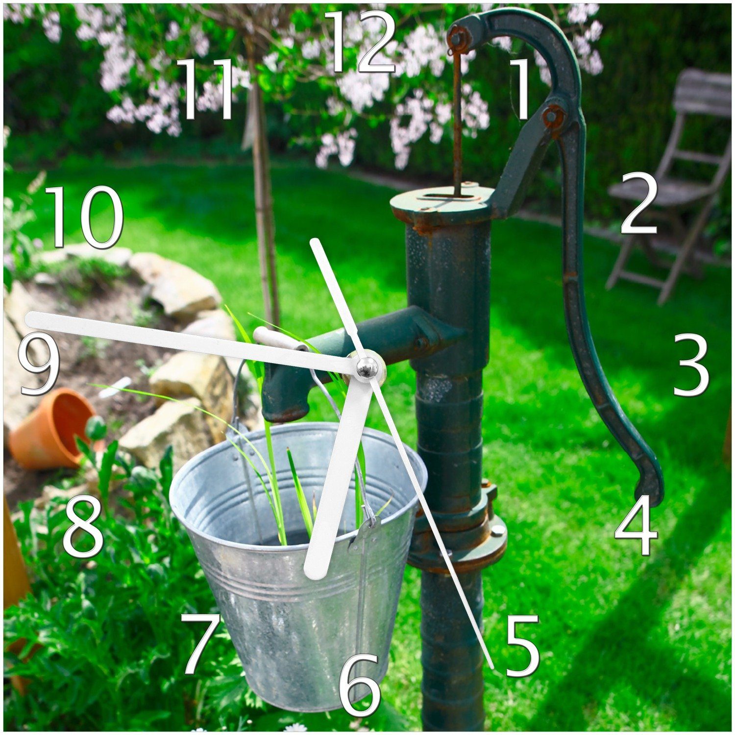 Wanduhr Wasserquelle im Garten