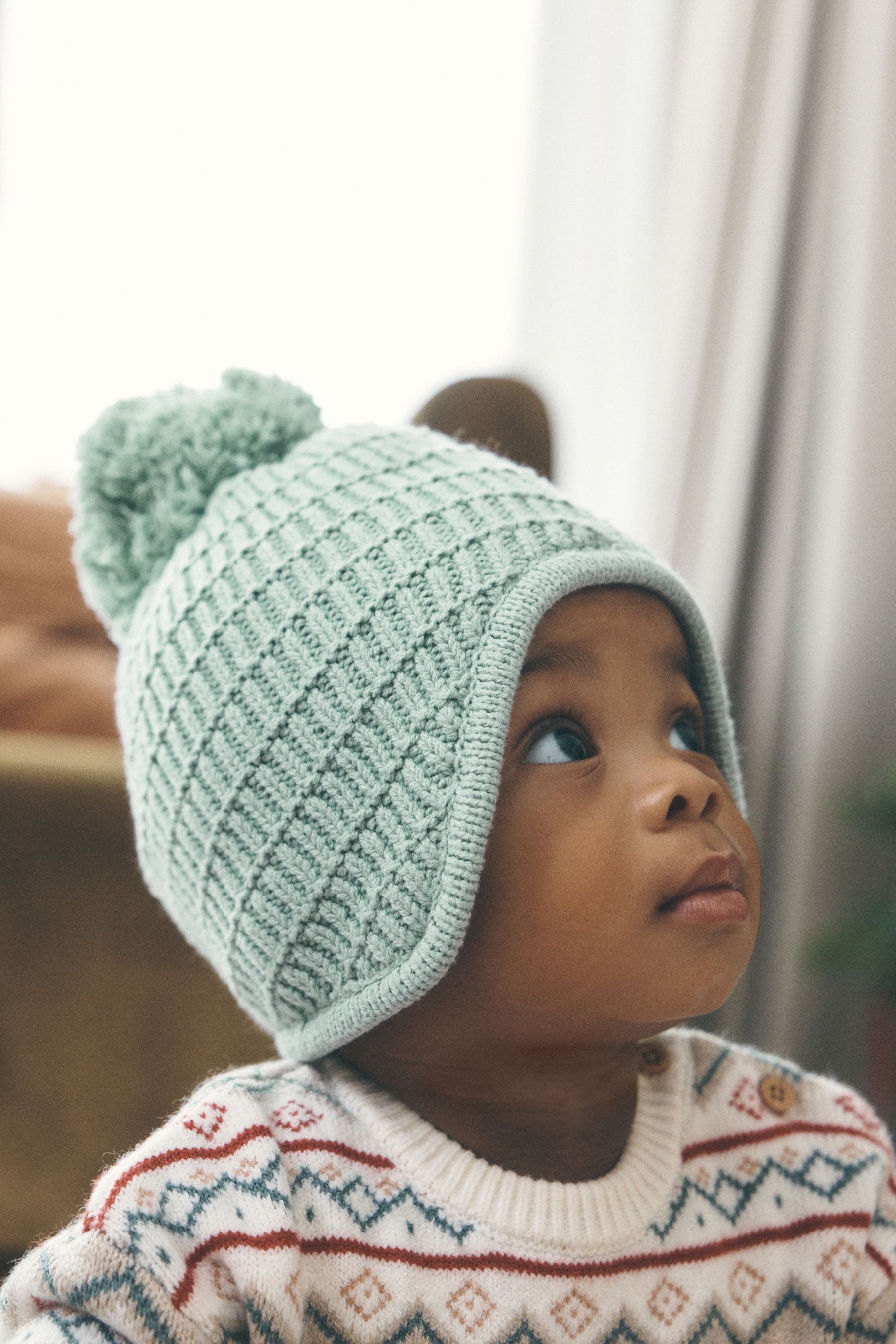 Next Strickmütze Gestrickte Baby Trappermütze (1-St)