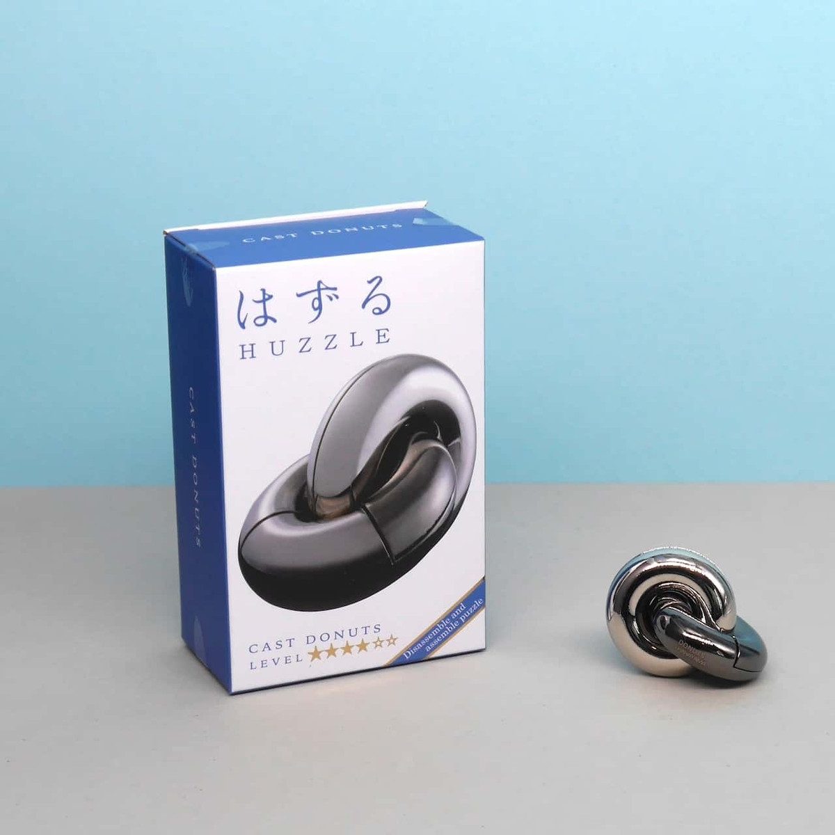 Hanayama Spiel HUZZLE CAST DONUTS - reizvolles Logikspiel, Knobelspiel, Metallpuzzle