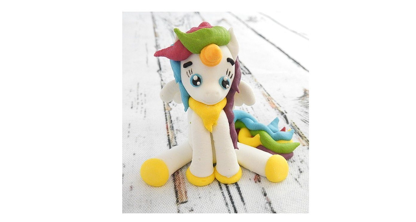 Festivalartikel Dekofigur Essbare Einhorn-Figur aus Zucker günstig online kaufen