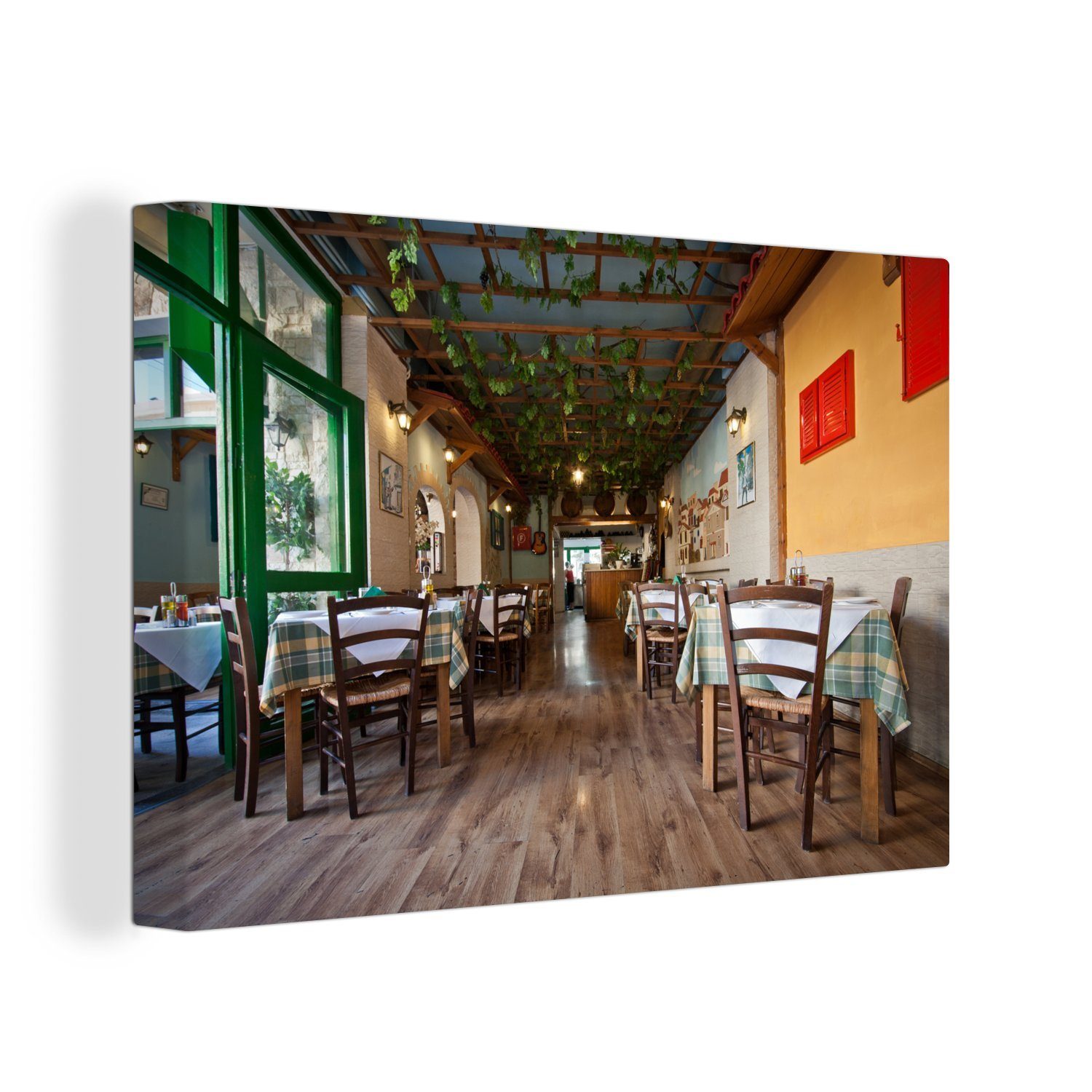 OneMillionCanvasses® Leinwandbild Ein traditionelles griechisches Restaurant in Heraklion, (1 St), Wandbild Leinwandbilder, Aufhängefertig, Wanddeko, 30x20 cm