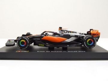 Bburago Modellauto McLaren MCL60 Formel 1 2023 #81 Piastri mit Figur Modellauto 1:43, Maßstab 1:43