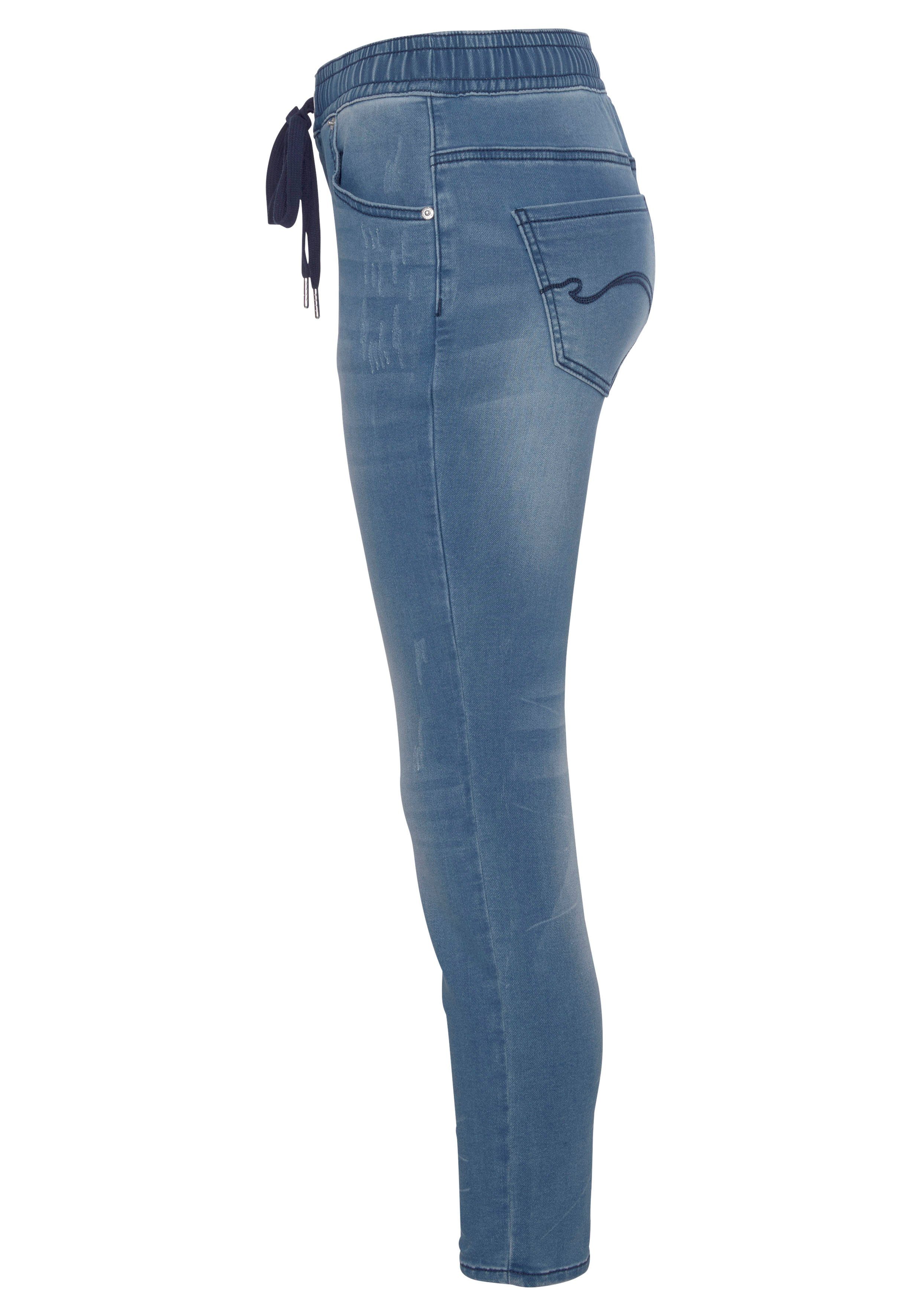KangaROOS Jogg Pants 7/8 in elastischem new-mid-blue-used JOGG-DENIM Bündchen mit Denim-Optik