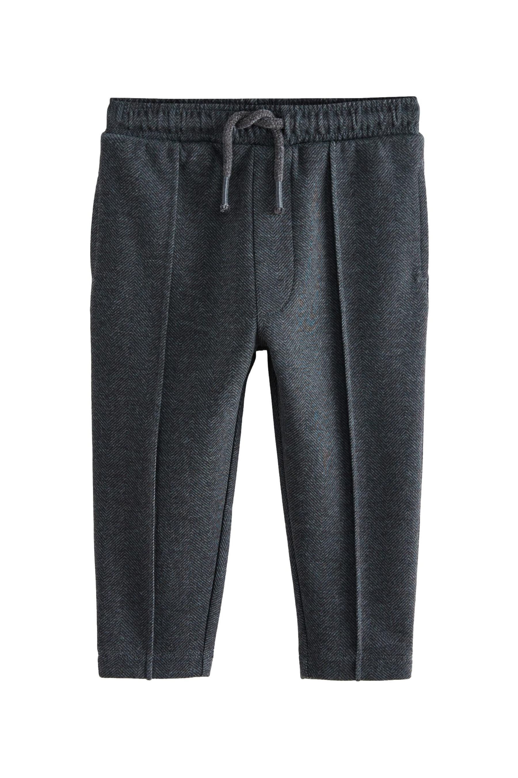 Jogginghose Jersey-Jogginghose mit Biesen und Fischgrätmuster