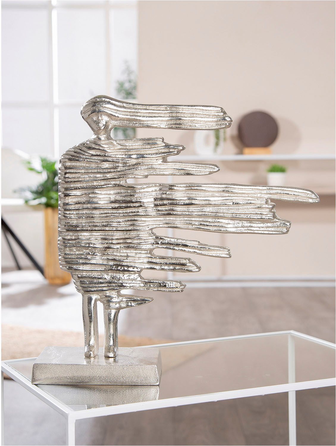 GILDE Dekofigur Skulptur Verwehung silberfarben H. 38 cm (1 St)