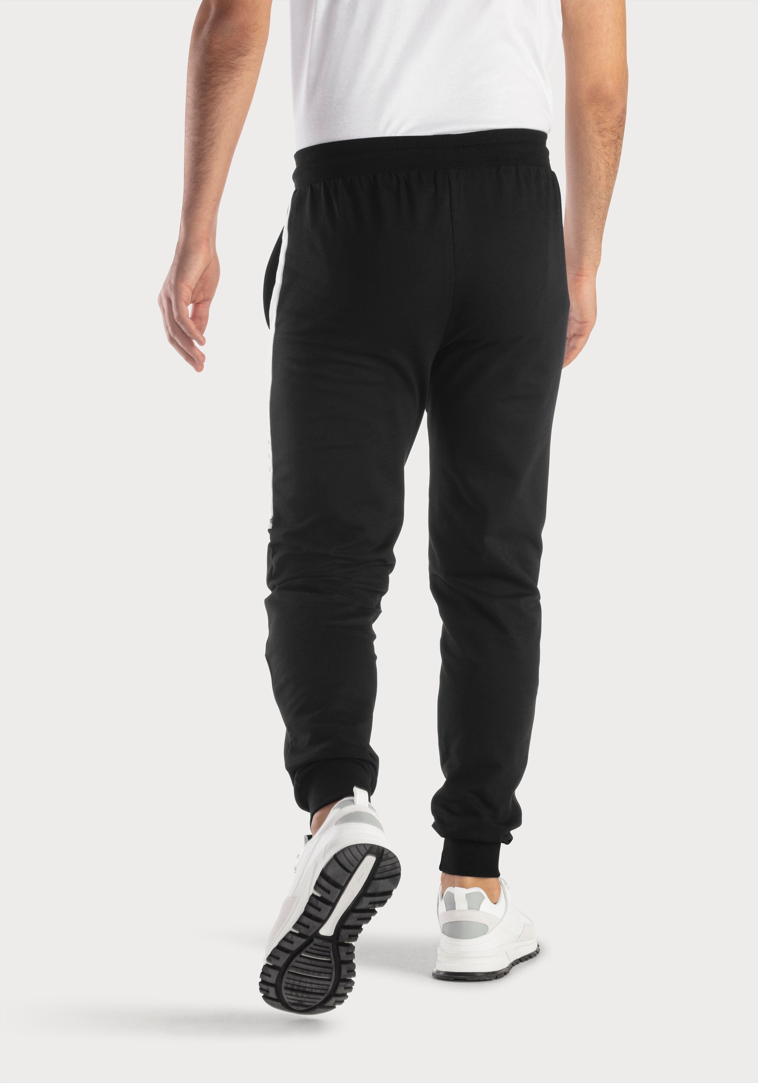 Sweathose mit Loungewear Beinabschluss Bündchen am Bench. schwarz