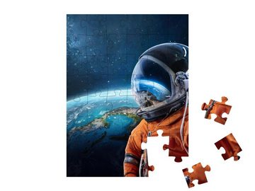 puzzleYOU Puzzle Astronaut auf der Umlaufbahn des Planeten Erde, 48 Puzzleteile, puzzleYOU-Kollektionen