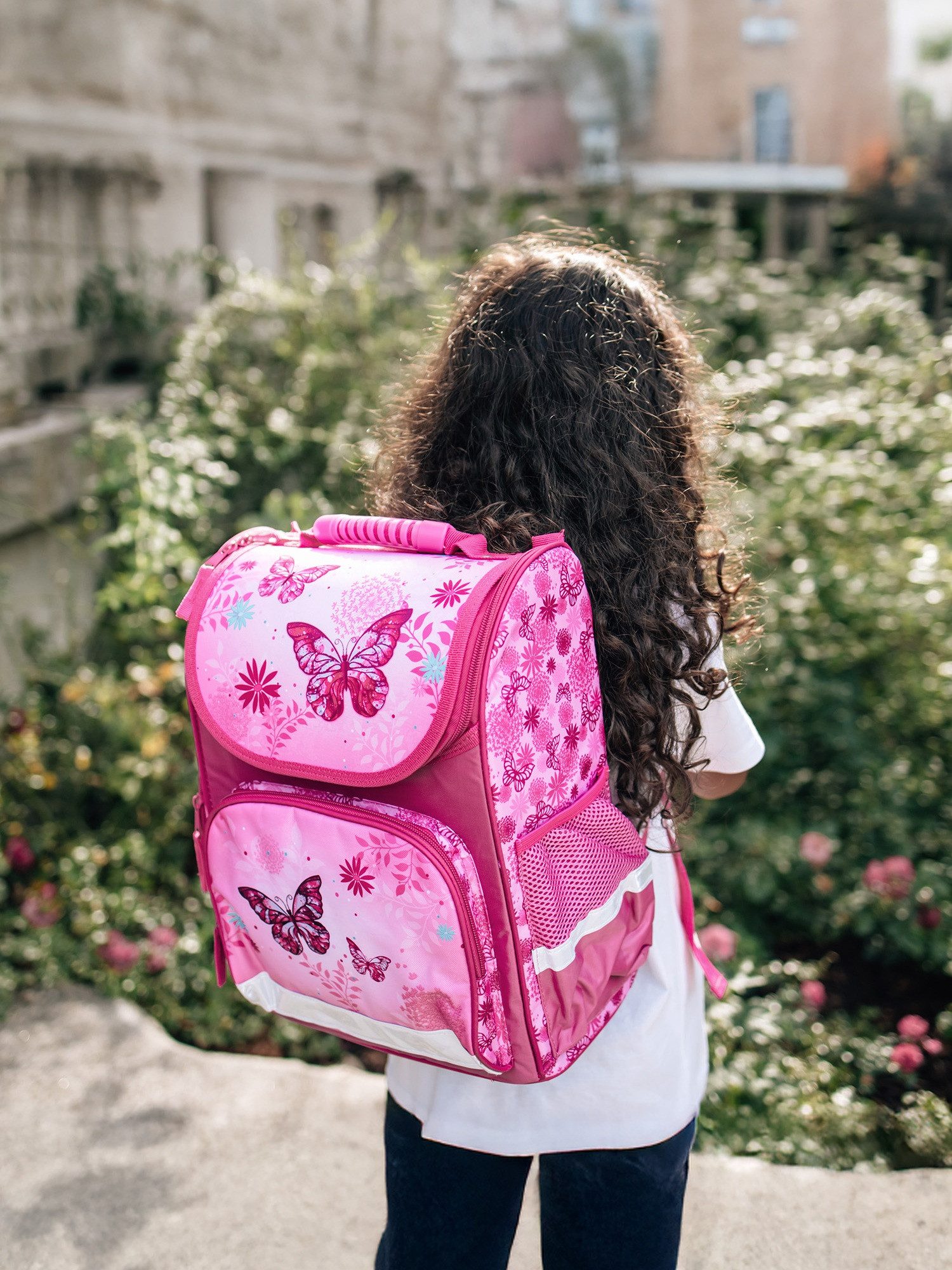Familando Schulranzen Clou Schmetterling Schultasche, Butterfly rosa, ab 1. Klasse (Komplett-Set, 10-tlg., mit Lunch-Set, Sporttasche und Schultüte 85cm), kompakt, mit 2-Wege Reißverschluss