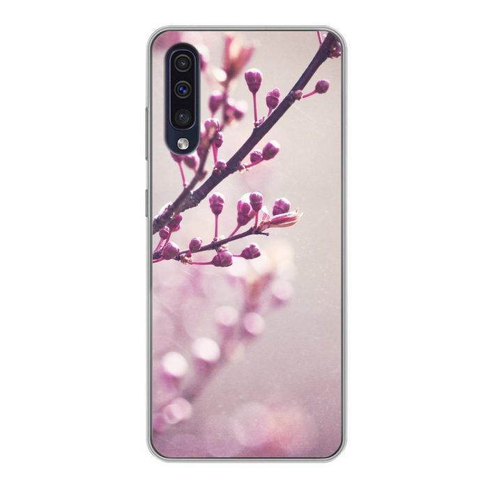 MuchoWow Handyhülle Nahaufnahme der violetten Blüten einer Sakura Handyhülle Samsung Galaxy A30s Smartphone-Bumper Print Handy