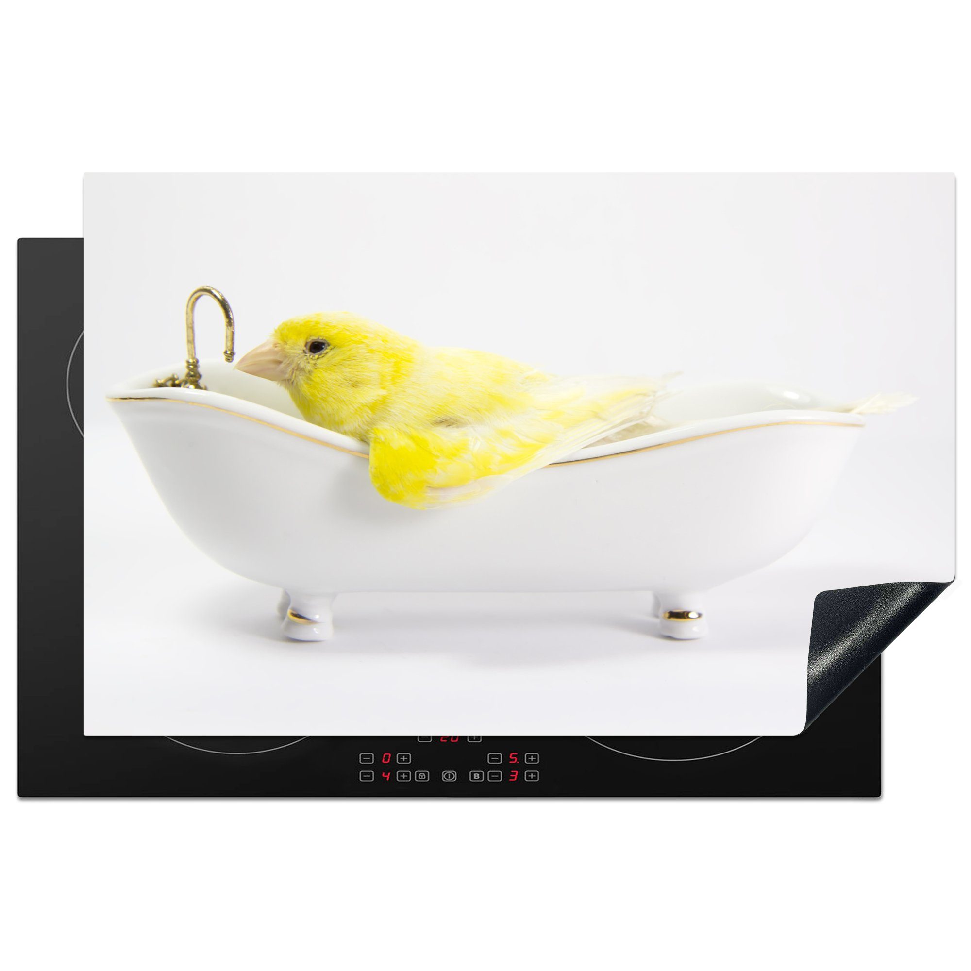 MuchoWow Herdblende-/Abdeckplatte Gelber Kanarienvogel in einer weißen Badewanne, Vinyl, (1 tlg), 81x52 cm, Induktionskochfeld Schutz für die küche, Ceranfeldabdeckung