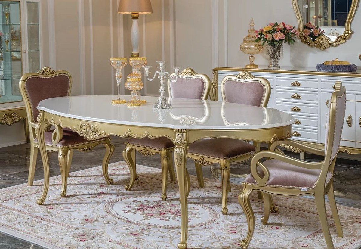 Casa Padrino Esszimmer-Set Luxus Barock Esszimmer Set Rosa / Weiß / Gold - 1 ovaler Esstisch & 6 Esszimmerstühle - Prunkvolle Esszimmer Möbel im Barockstil