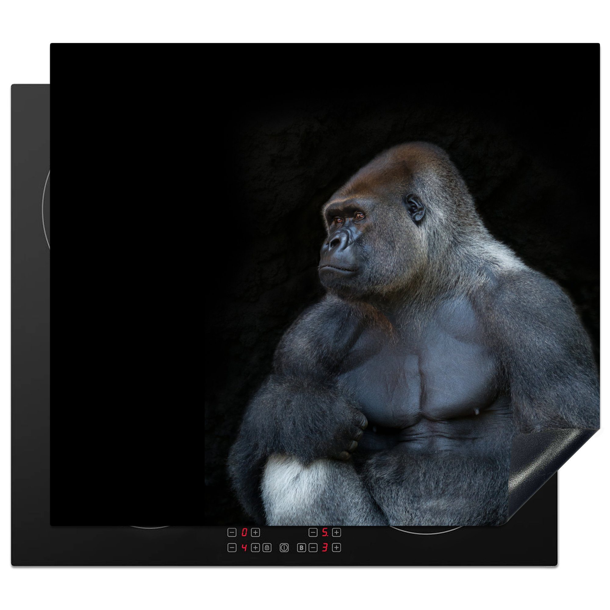 MuchoWow Herdblende-/Abdeckplatte Ein muskulöser Gorilla auf schwarzem Hintergrund, Vinyl, (1 tlg), 59x52 cm, Ceranfeldabdeckung für die küche, Induktionsmatte