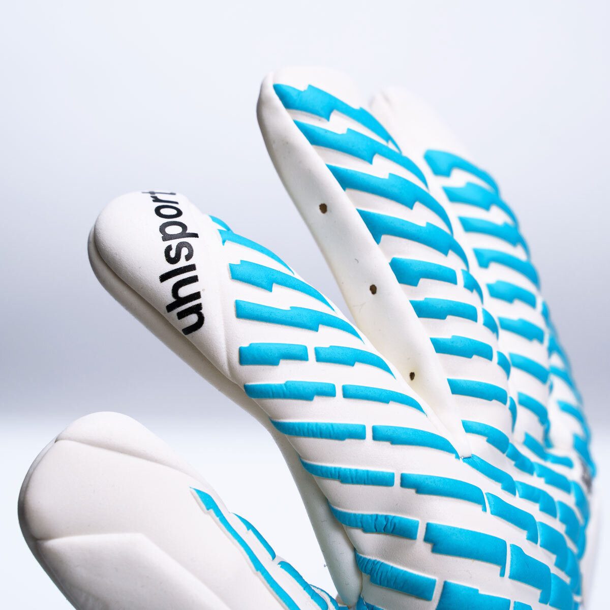 uhlsport Torwarthandschuhe Torwarthandschuhe FM Cybertec Supersoft HN (Paar, 1-St., mit Verschluss)