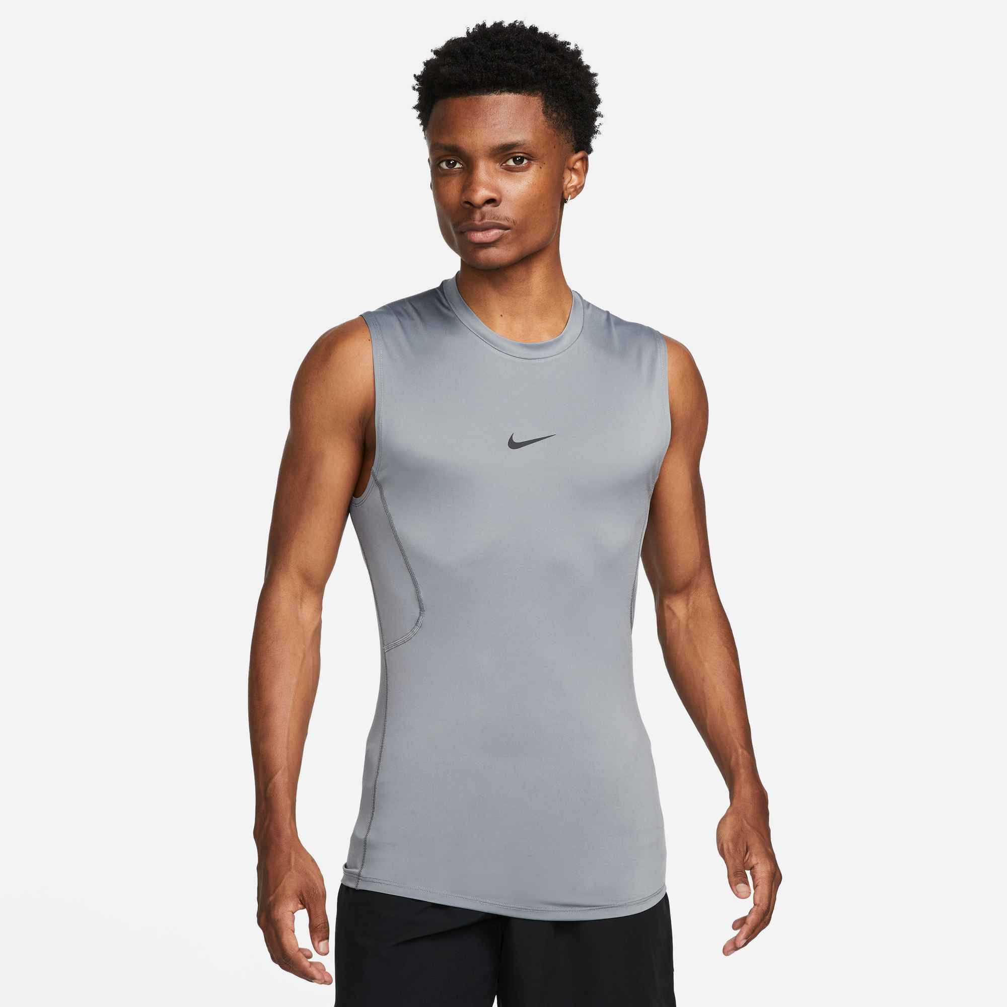 Nike Tanktop M NP DF TOP SL TIGHT schmal geschnitten, ärmelloses Design, mit rundem Saum