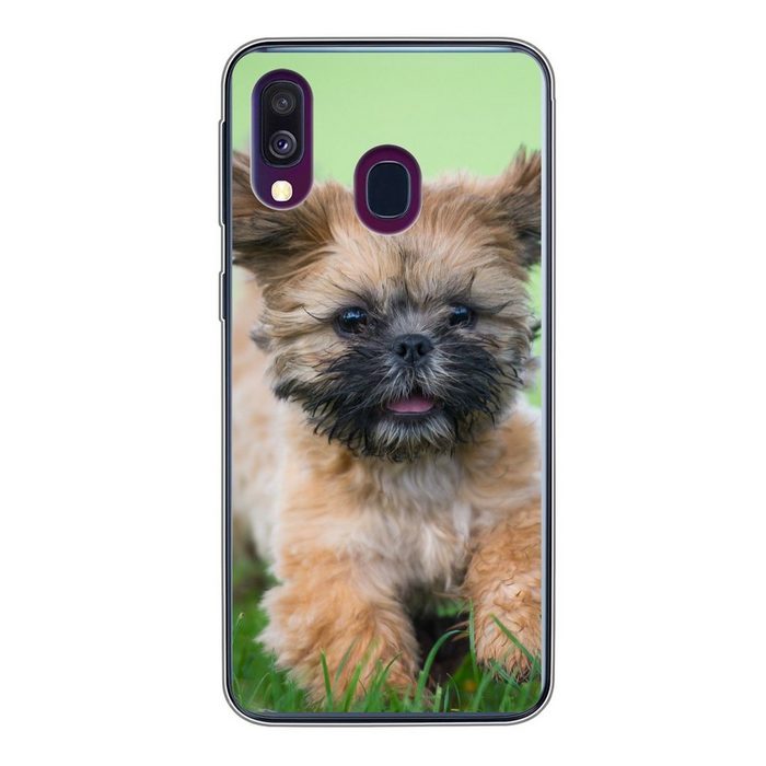 MuchoWow Handyhülle Ein niedlicher Shih Tzu Hund der durch das Gras läuft Handyhülle Samsung Galaxy A40 Smartphone-Bumper Print Handy