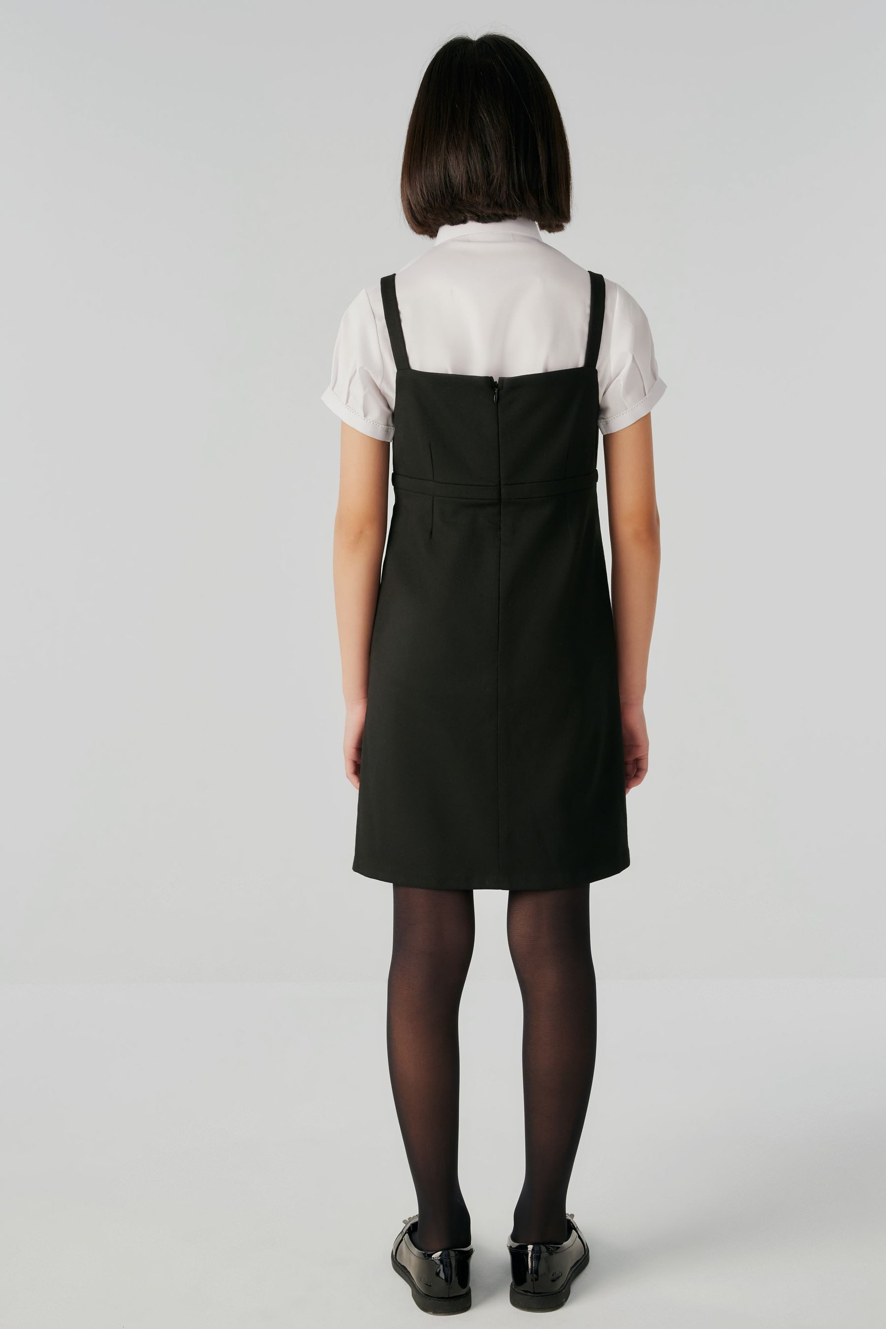 Clarks Latzkleid Clarks Trägerkleid für große Mädchen (1-tlg)