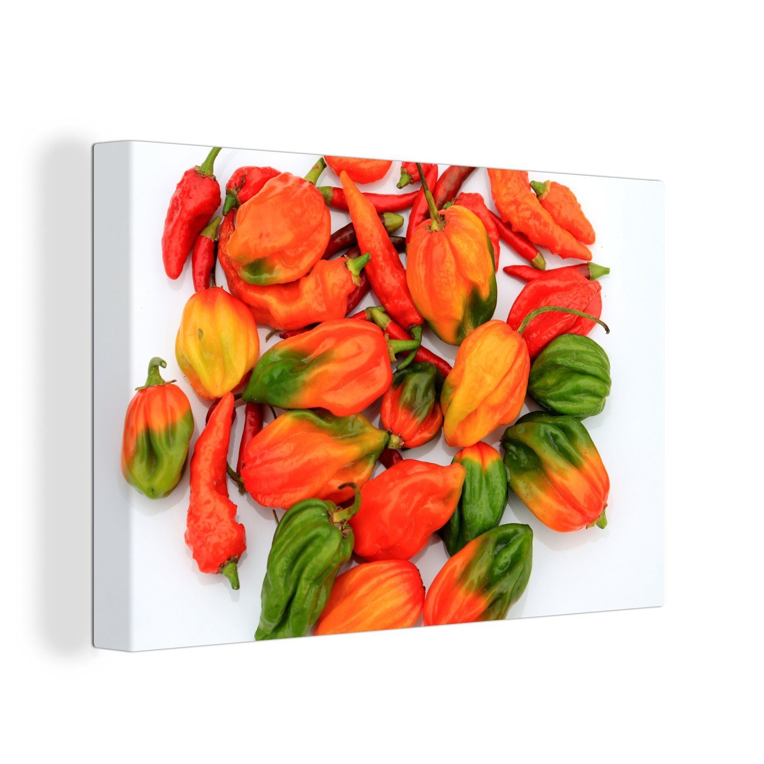 OneMillionCanvasses® Leinwandbild Reife Paprika auf weißem Hintergrund, (1 St), Wandbild Leinwandbilder, Aufhängefertig, Wanddeko, 30x20 cm | Leinwandbilder