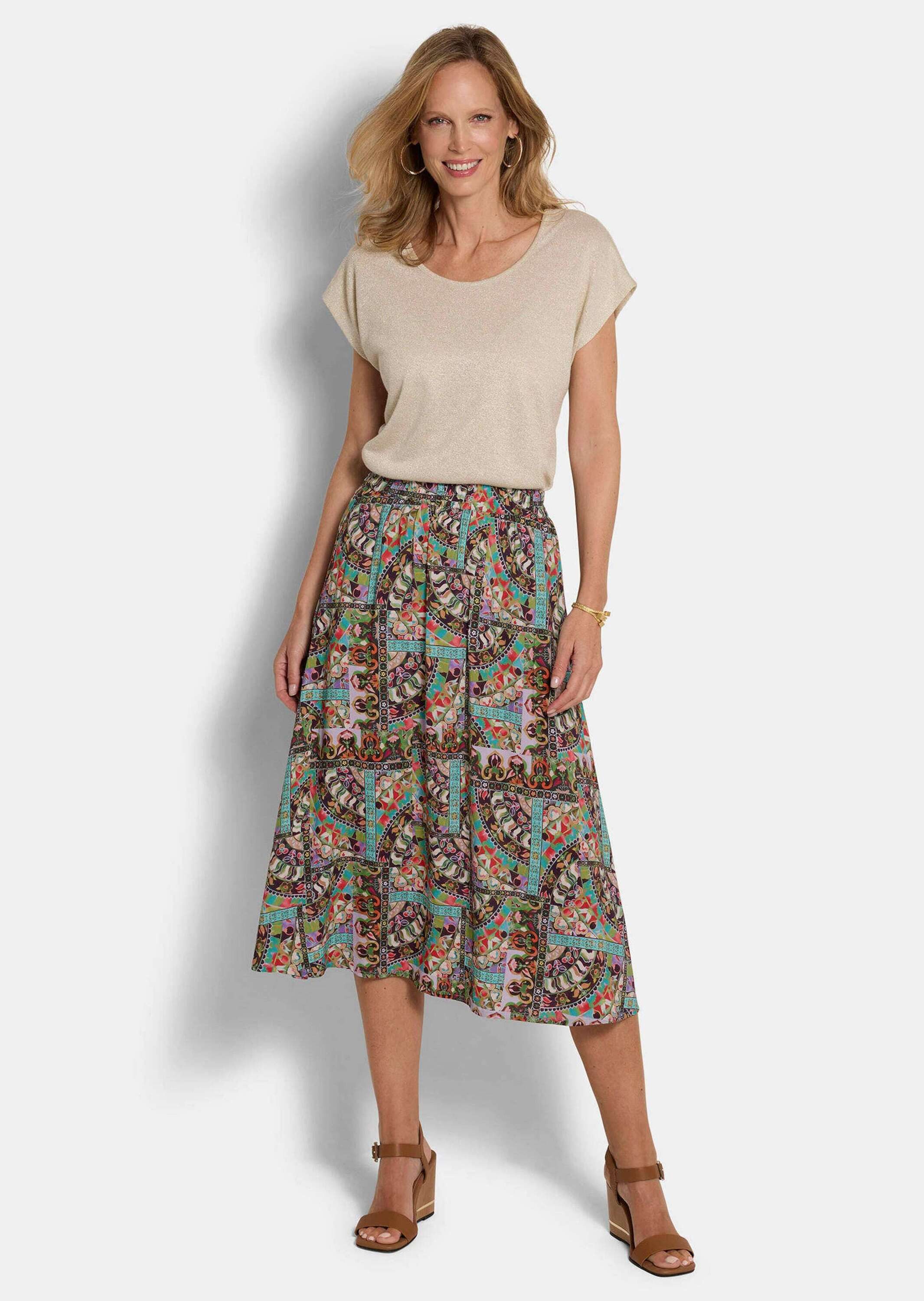 GOLDNER Schlupfrock Kurzgröße: Viskoserock mit Patch-Druck Schlupfrock mit Rundum-Dehnbund, Nahttaschen und Knielänge