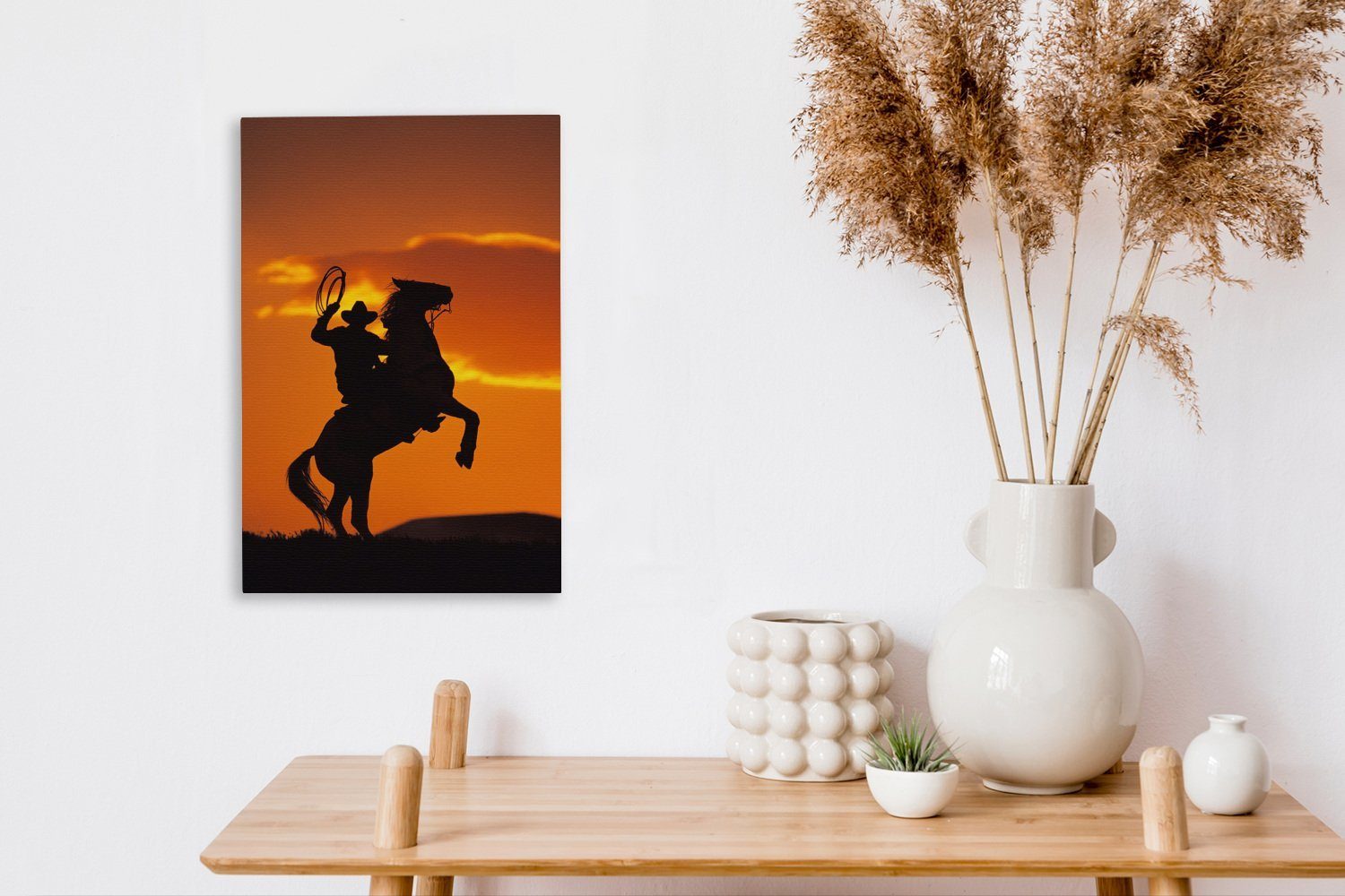 Cowboys der Pferderücken, 20x30 Leinwandbild inkl. Zackenaufhänger, St), bespannt eines auf Gemälde, fertig Leinwandbild (1 OneMillionCanvasses® dem Silhouette cm tänzelt,