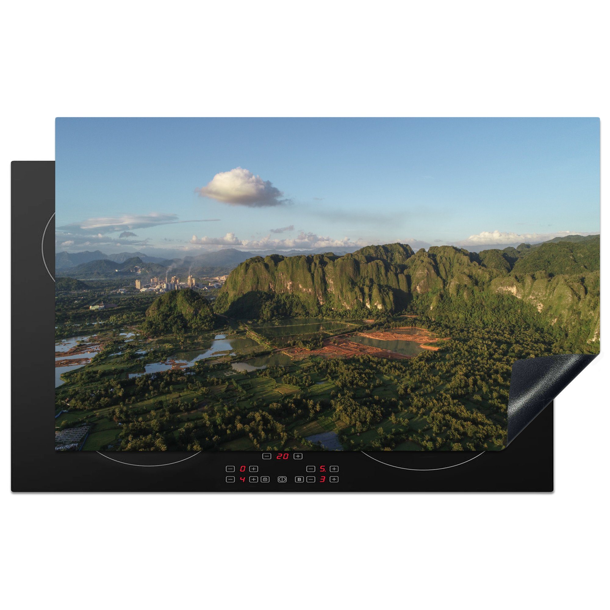 MuchoWow Herdblende-/Abdeckplatte Die grünen Berge rund um die Stadt Makassar Indonesien, Vinyl, (1 tlg), 83x51 cm, Ceranfeldabdeckung, Arbeitsplatte für küche