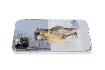 MuchoWow Handyhülle Laufendes Fjordpferd im Schnee, Handyhülle Apple iPhone 12 Pro Max, Smartphone-Bumper, Print, Handy