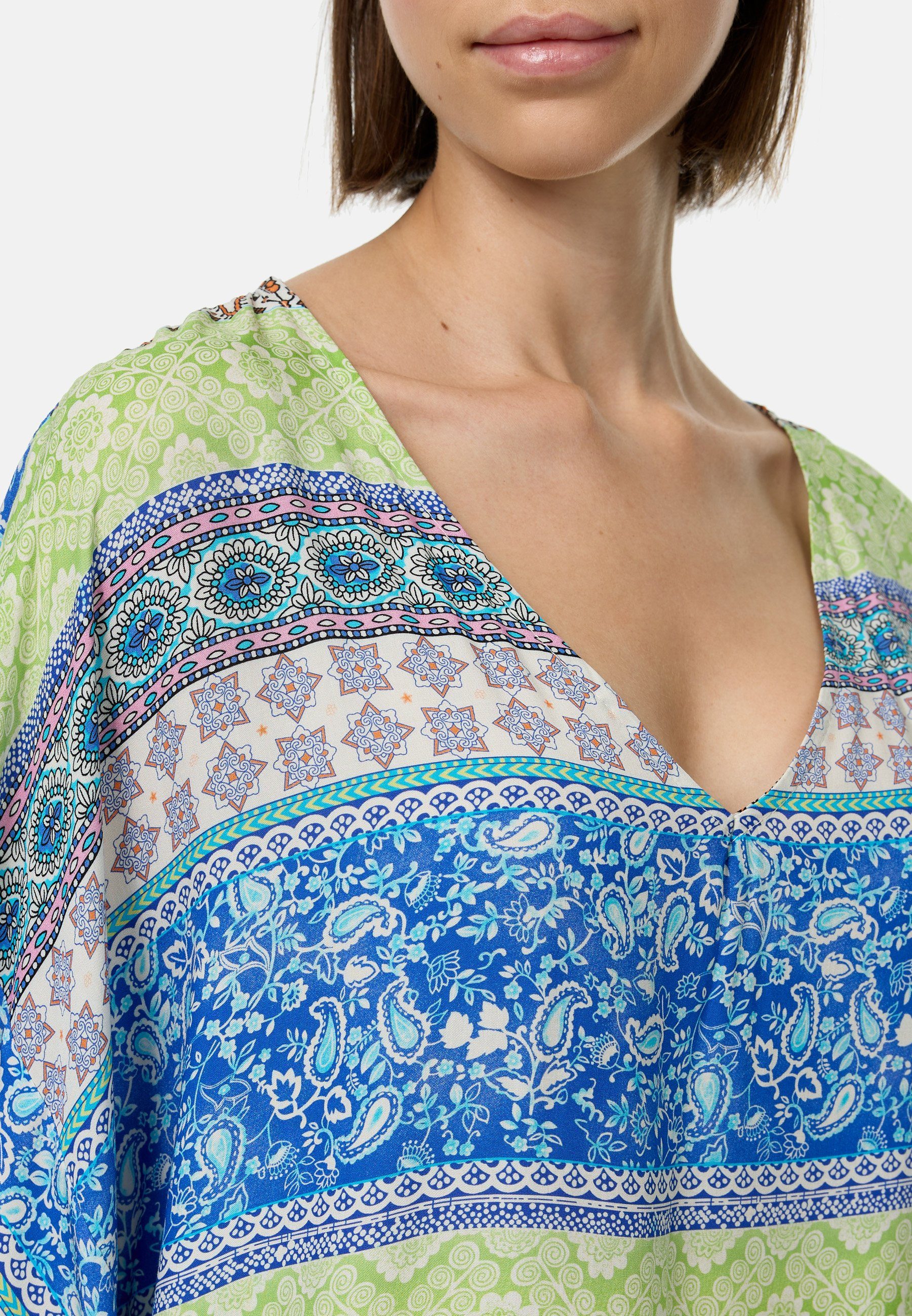 Rayshyne Schlupfbluse PM58 (Extravagante Tunika Bluse mit auffallendem Print) seitlicher Faltenwurf