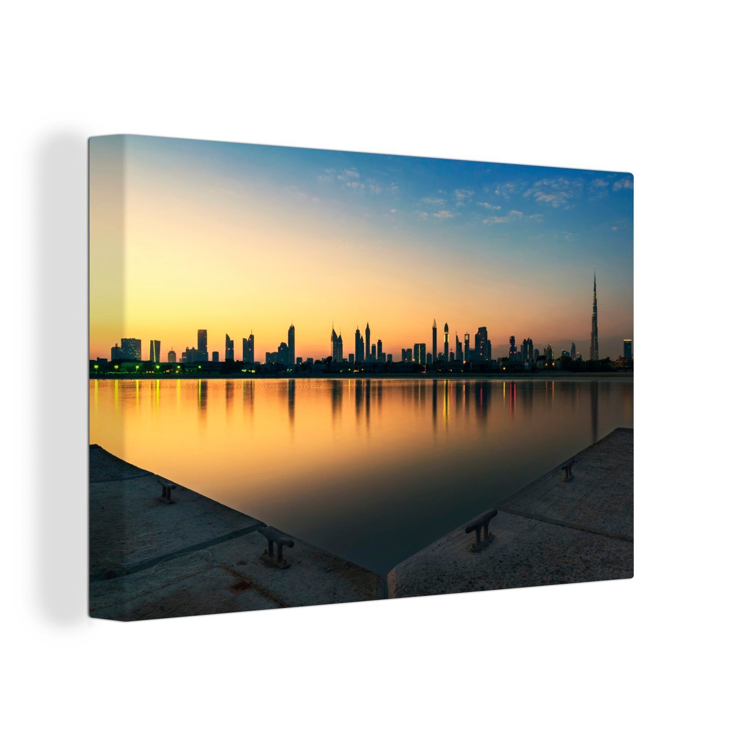 OneMillionCanvasses® Leinwandbild Die beeindruckende Silhouette von Dubais Wolkenkratzern bei, (1 St), Wandbild Leinwandbilder, Aufhängefertig, Wanddeko, 30x20 cm