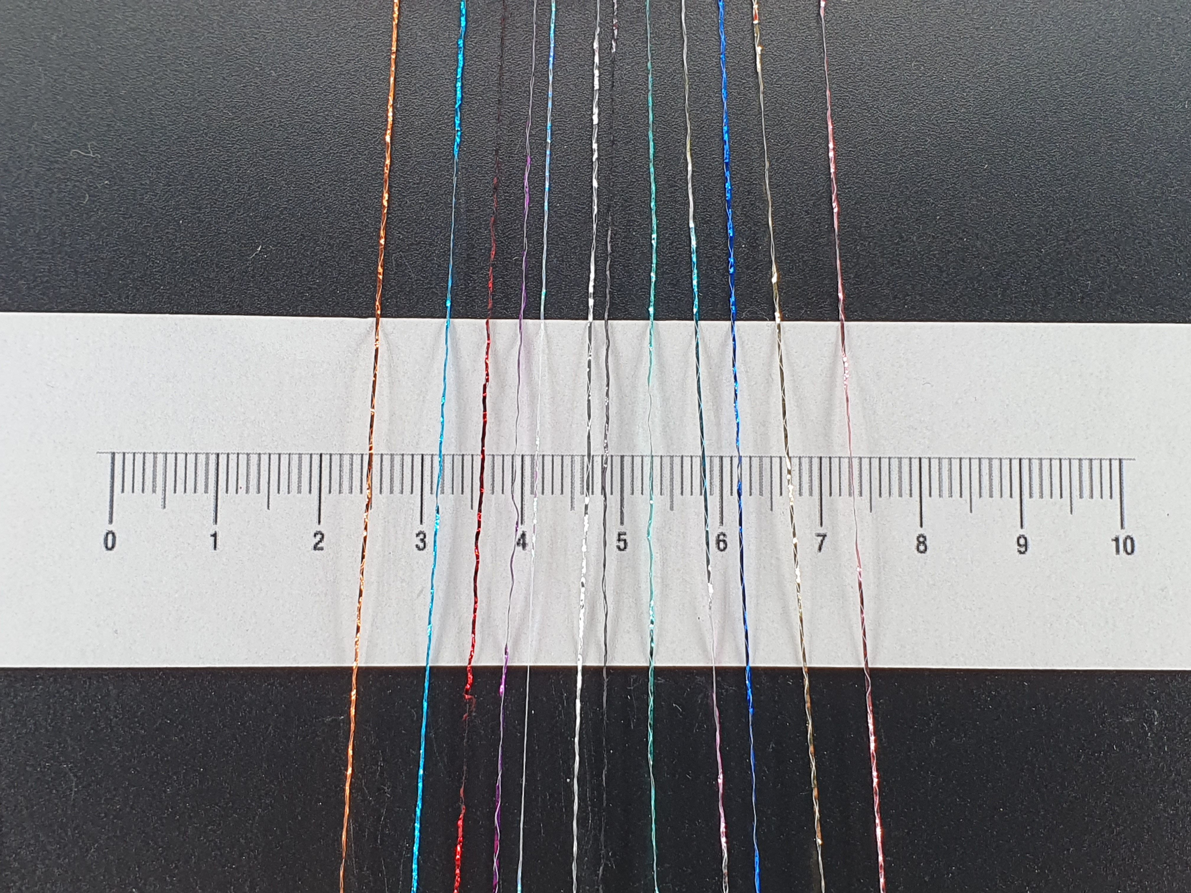 NOGA EFFEKTGARN GmbH Glitzer Beilaufgarn auf 1000 Meter Spule Effektgarn