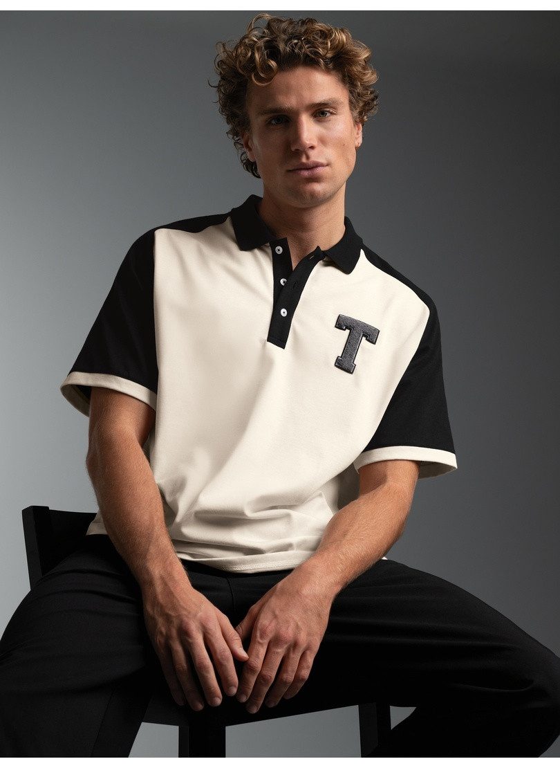 Trigema Poloshirt TRIGEMA Oversized Raglan T Shirt mit trigema Printmotiv (1-tlg)