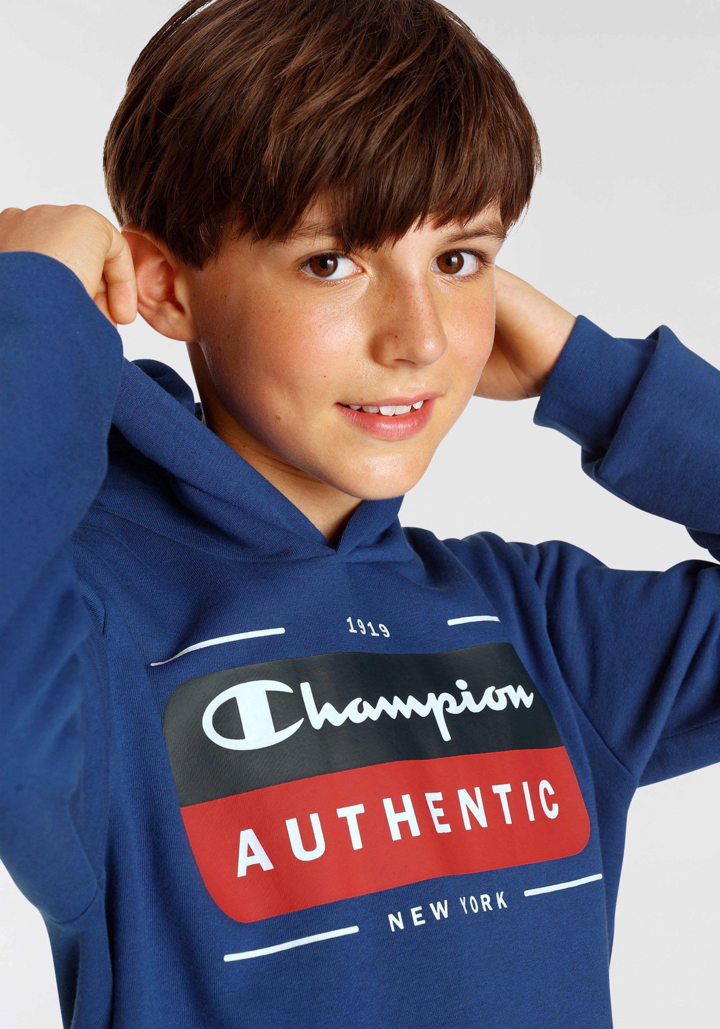 - Champion Graphic für Shop Sweatshirt blau Hooded Kinder Sweatshirt